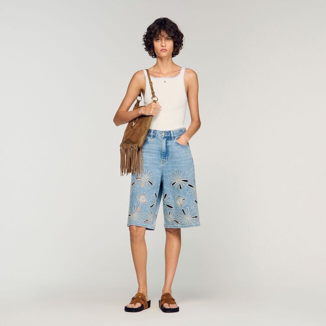 D&eacute;bardeur en maille c&ocirc;tel&eacute;e