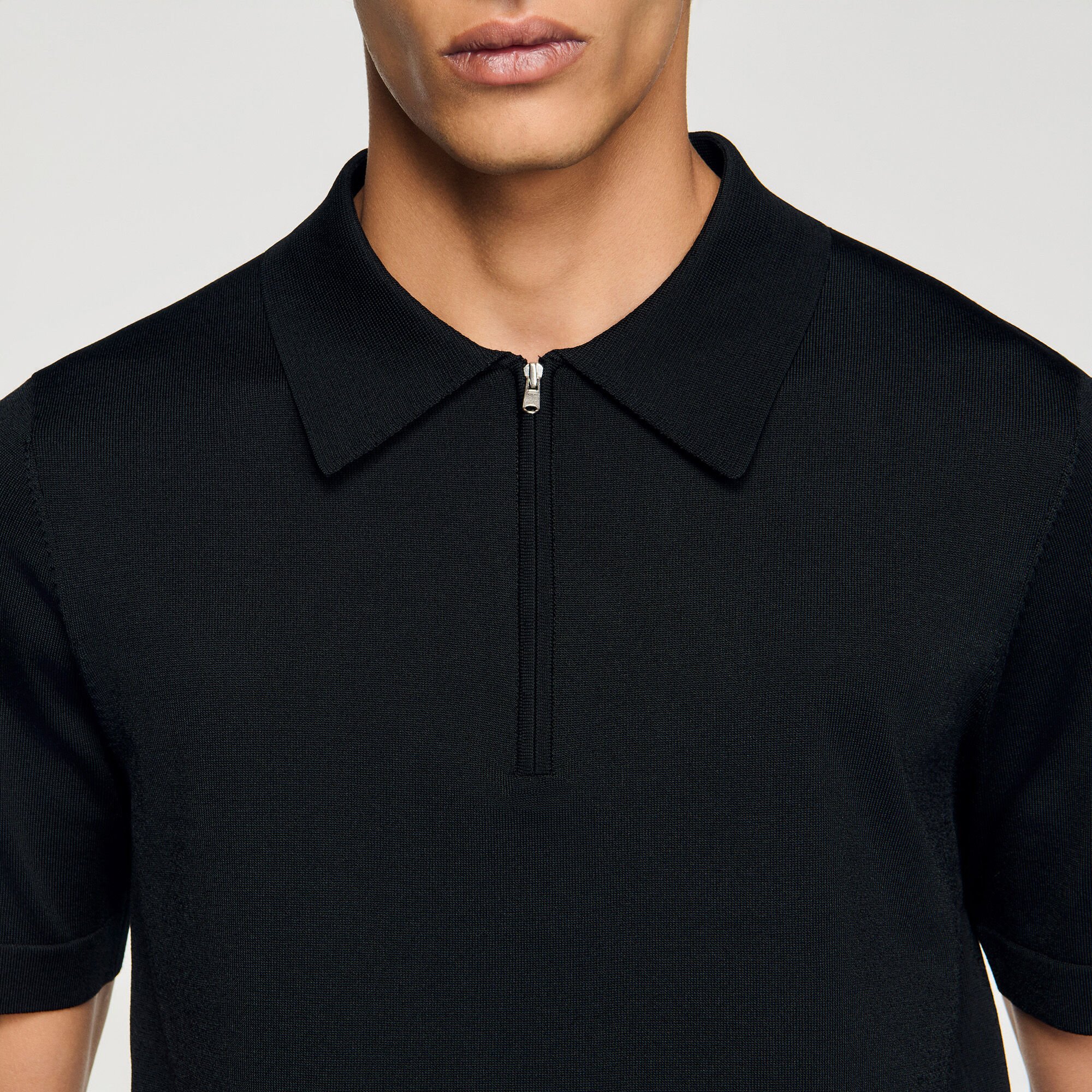 Polo en maille à col zippé
