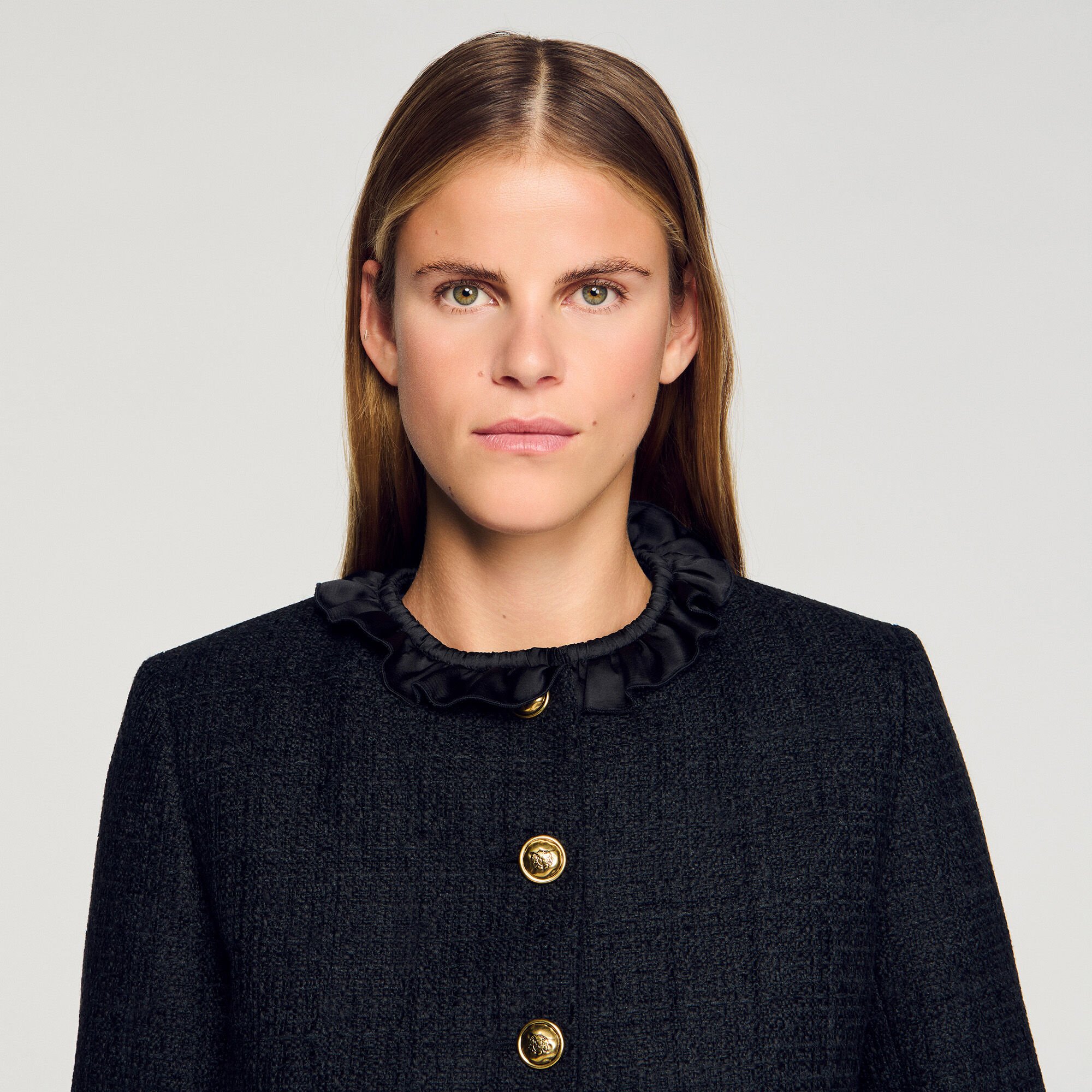 Veste en tweed à volants