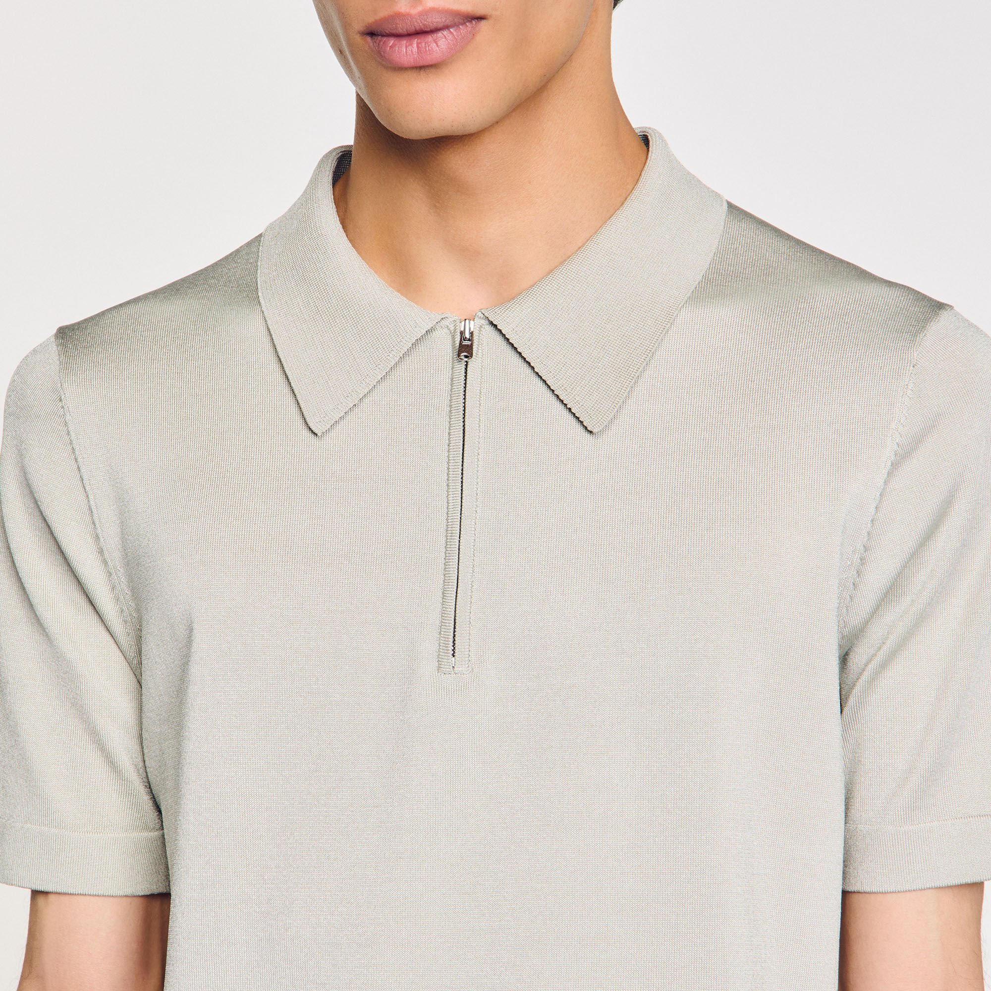 Polo en maille à col zippé