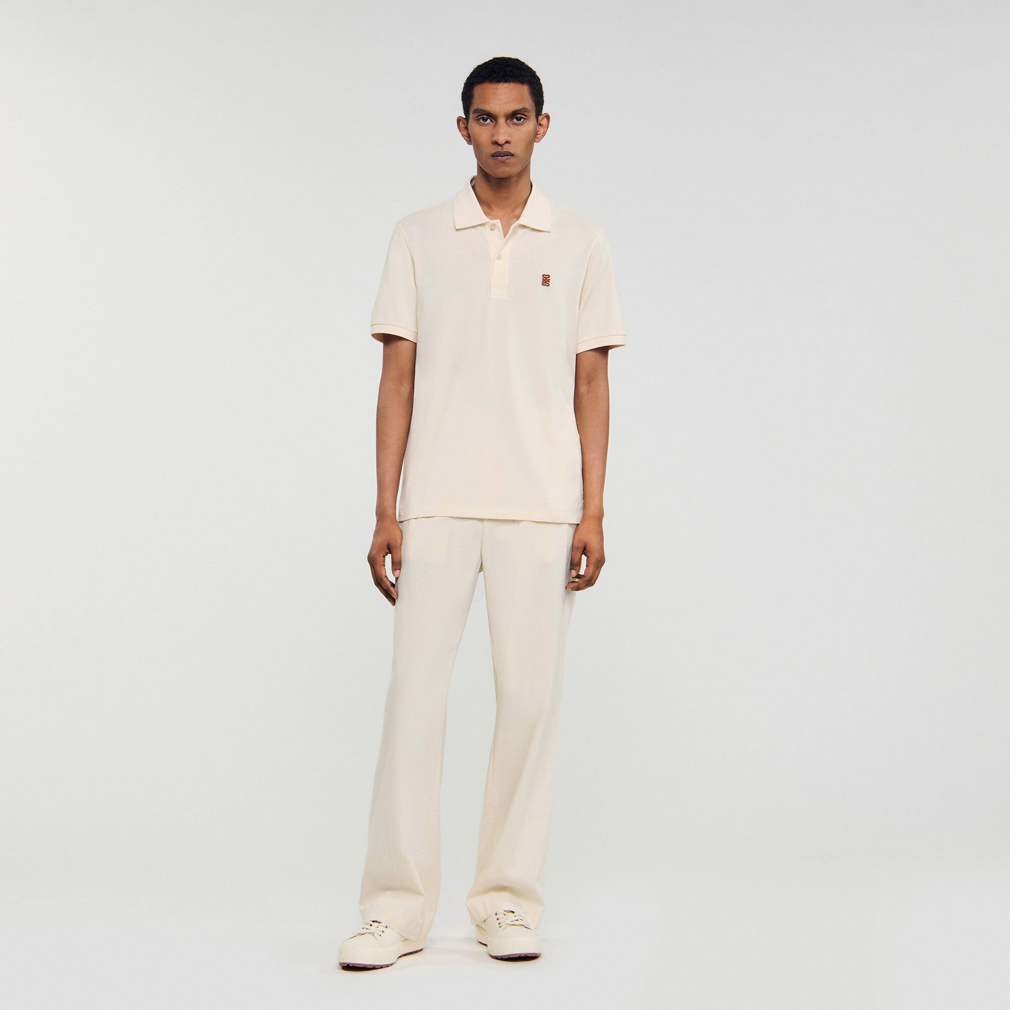 Polo à logo cuir