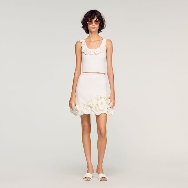 Jupe courte en maille &agrave; fleurs