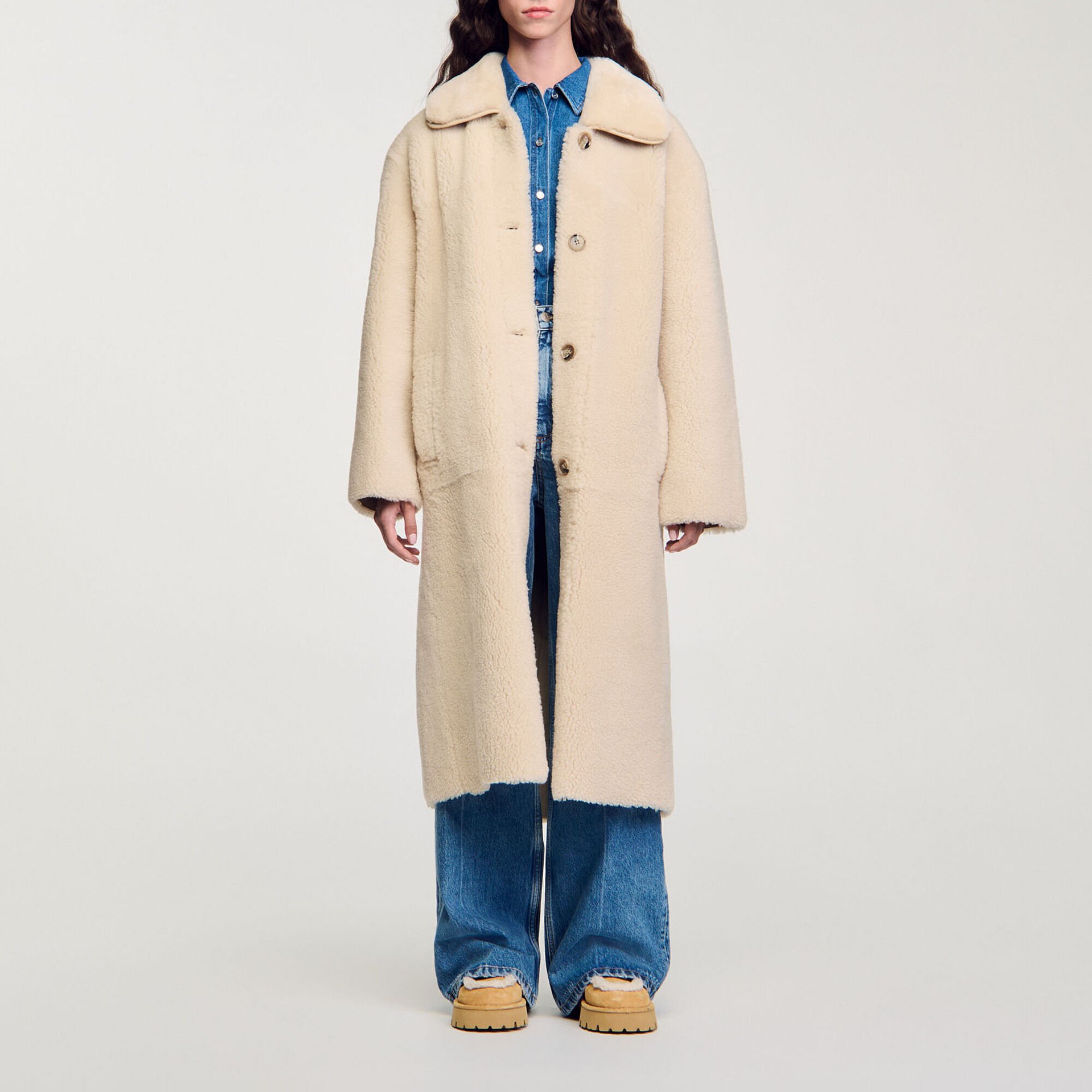 Manteau en peau lainée