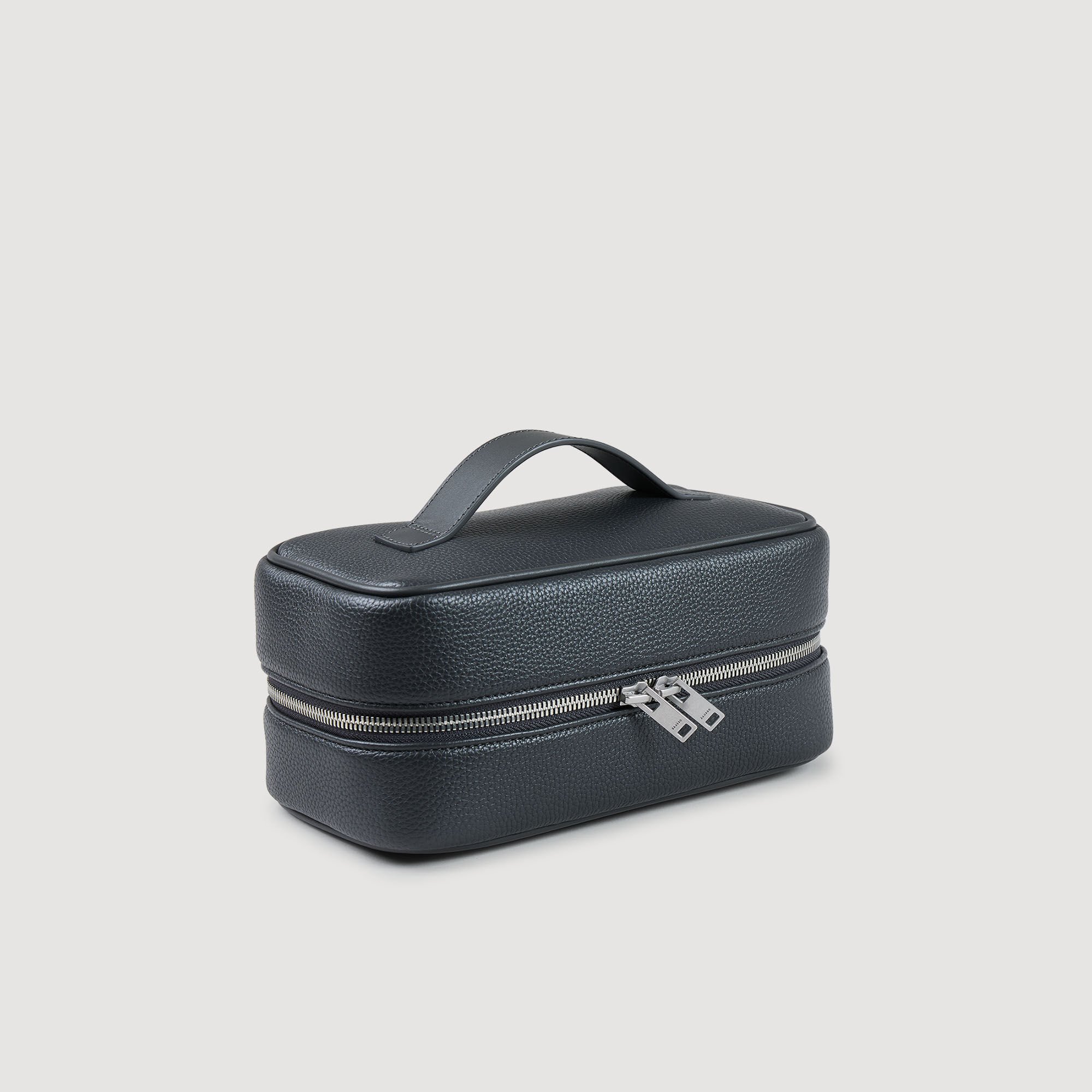 Trousse de toilette en toile enduite