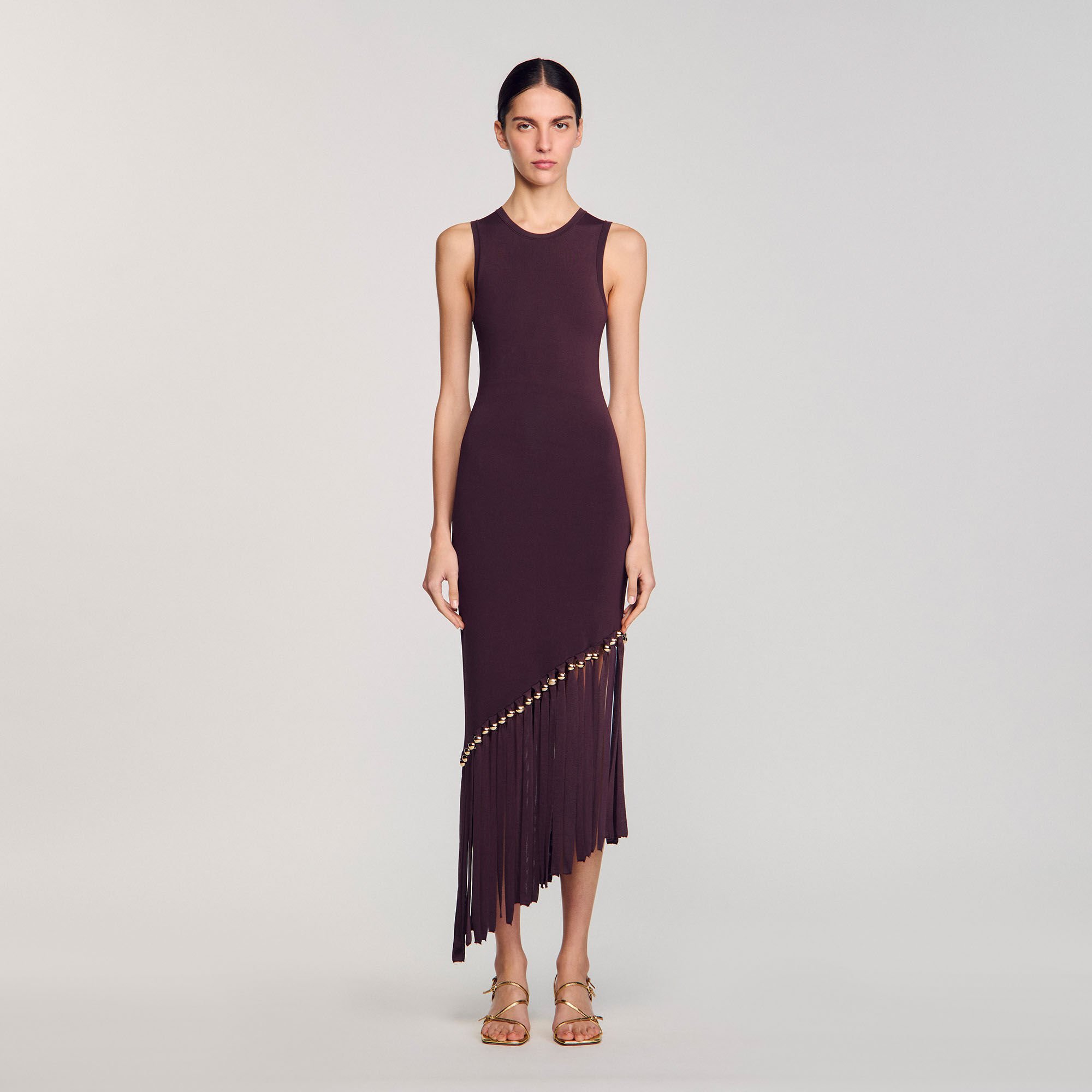 Robe longue frangée et perlée