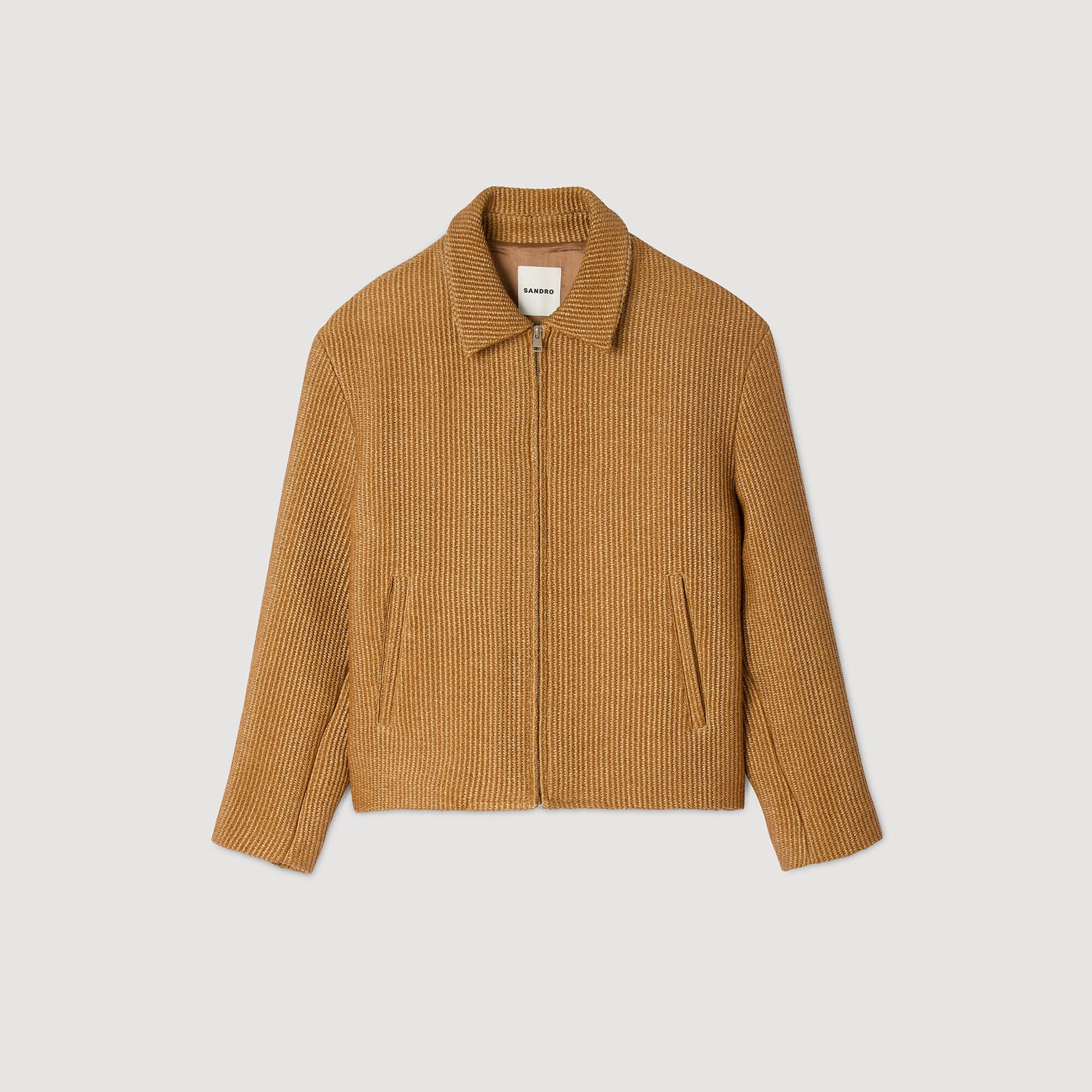 Blouson en raphia tressé