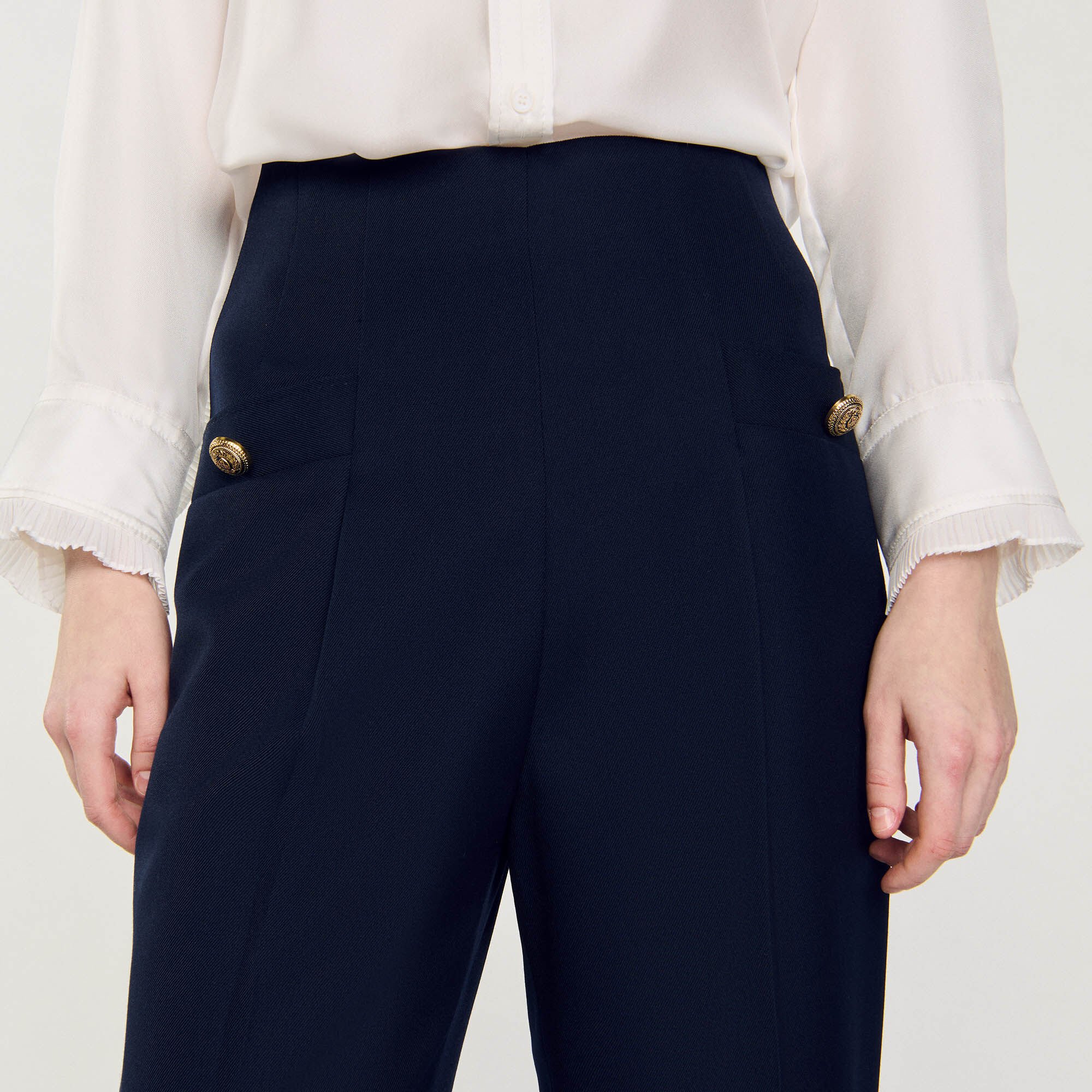 Pantalon de costume à plis