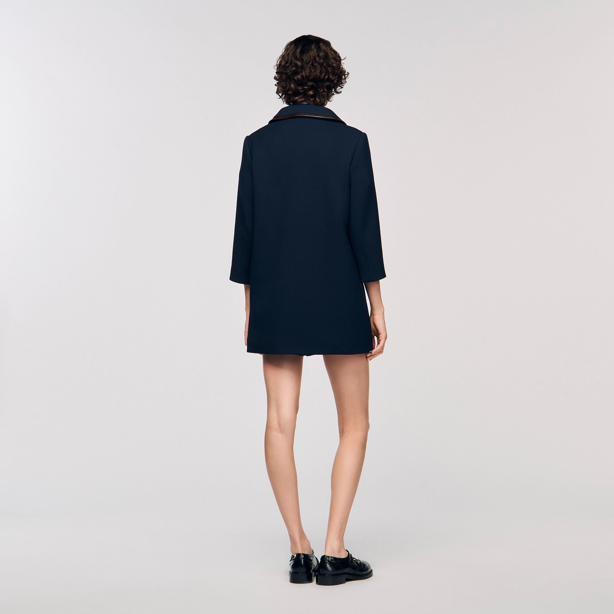 Manteau à bandes en cuir