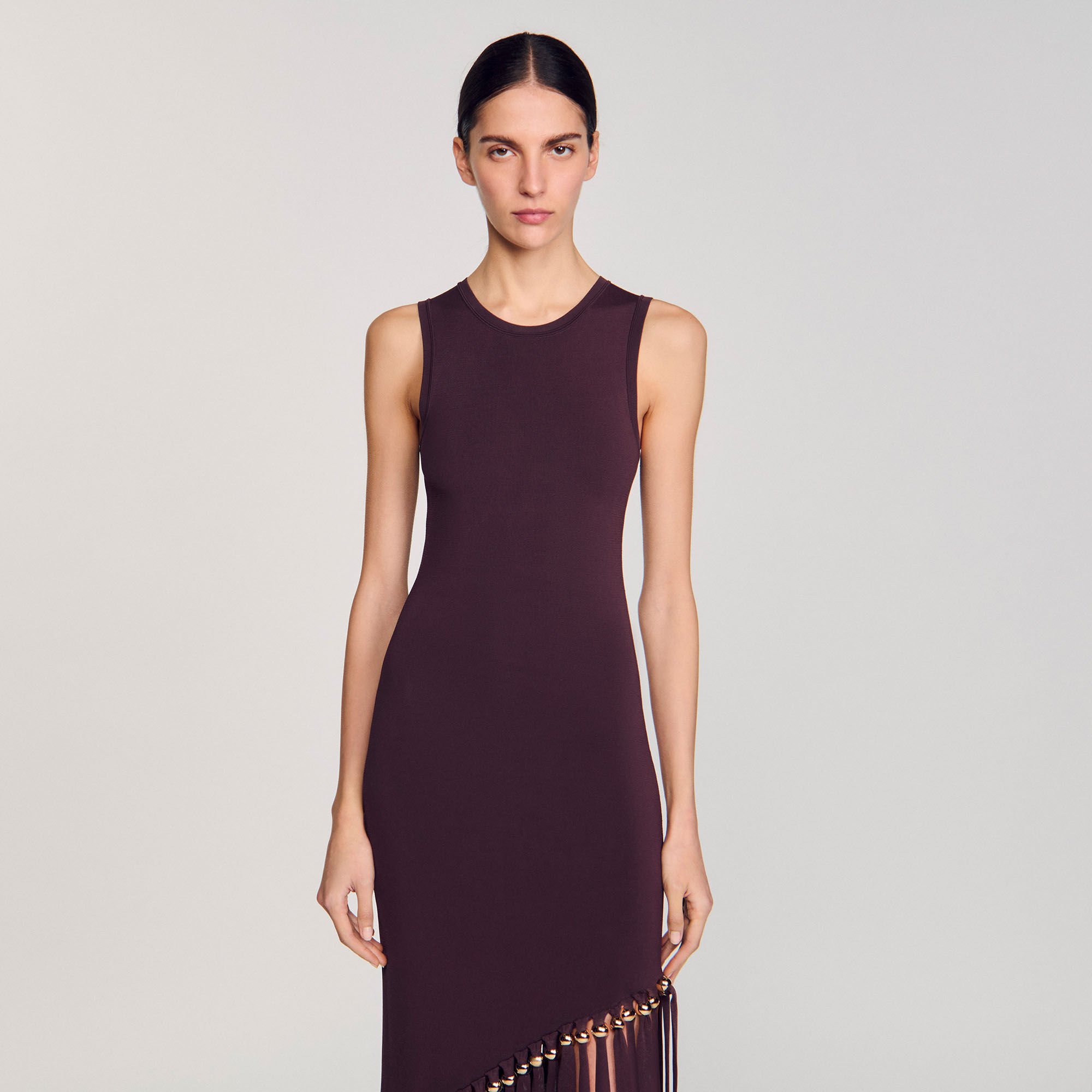 Robe longue frangée et perlée