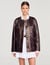 Blouson long en cuir vieilli