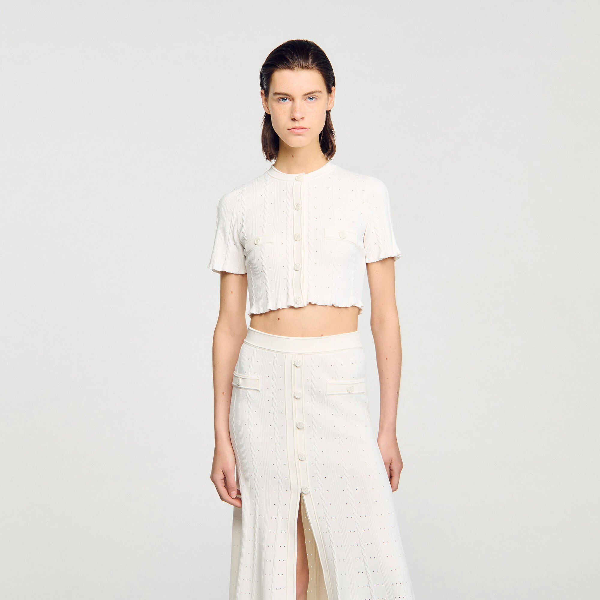 Cardigan court en maille pointelle