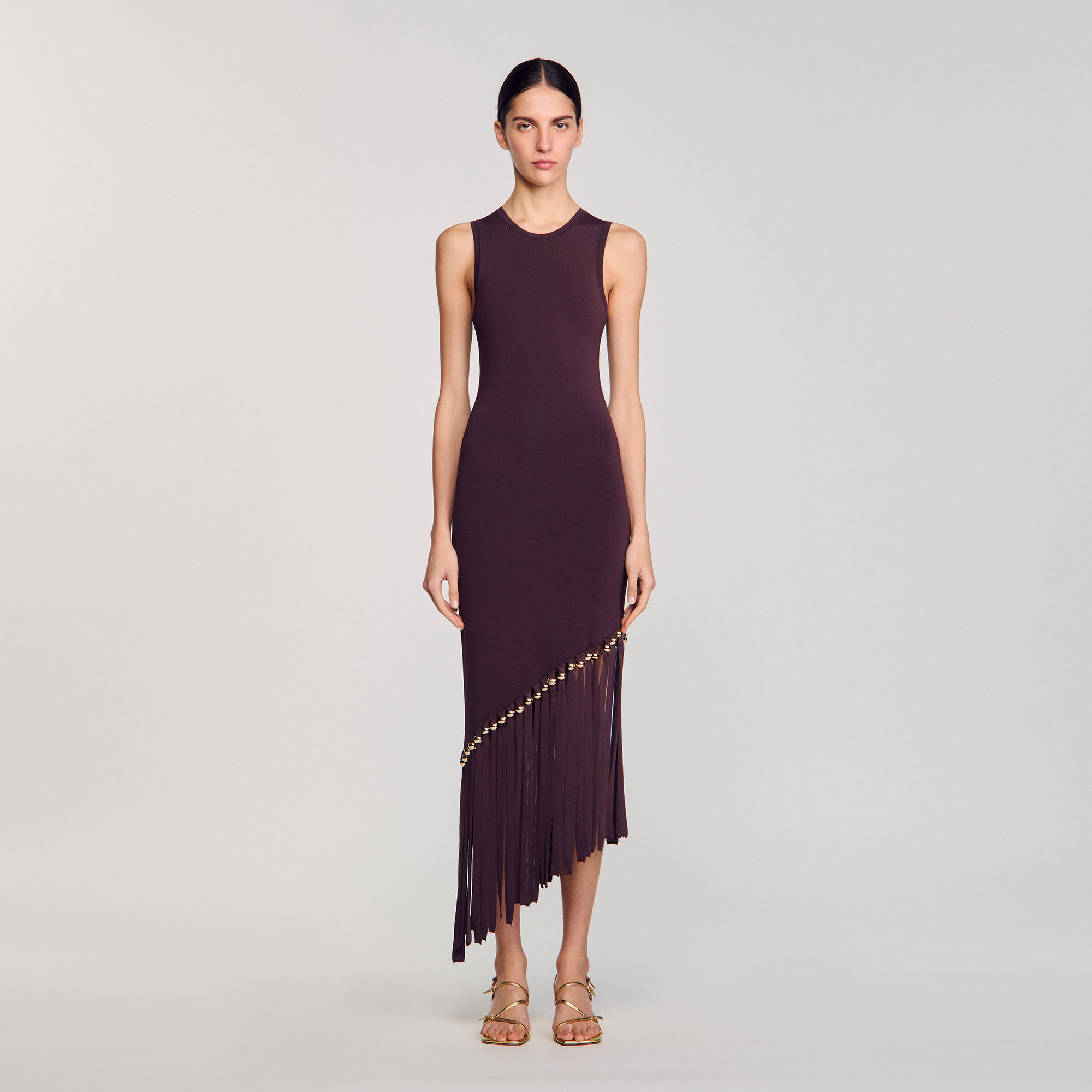 Robe longue frangée et perlée