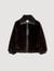 Manteau court en fausse fourrure  Manteau court en fausse fourrure