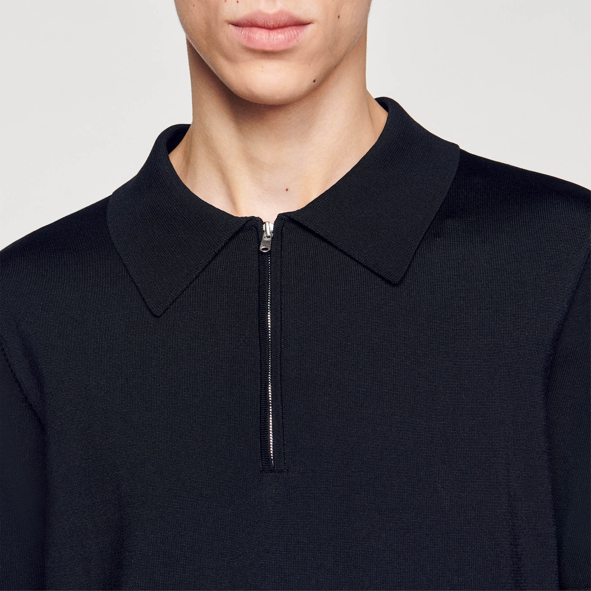 Polo en maille à col zippé