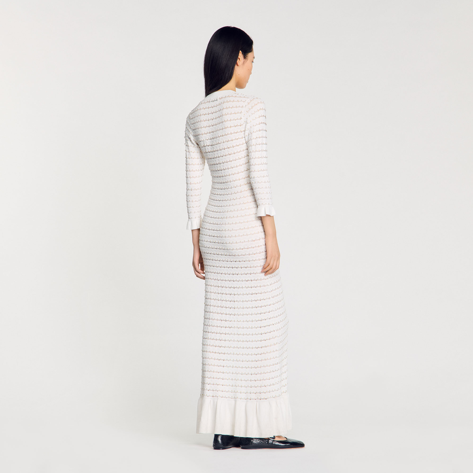 Robe longue à détails perlés
