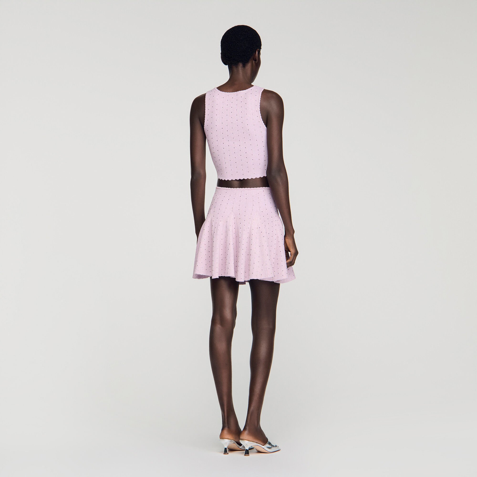 Jupe courte en maille strass&eacute;e