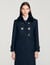 Manteau long avec col en peau lainée
