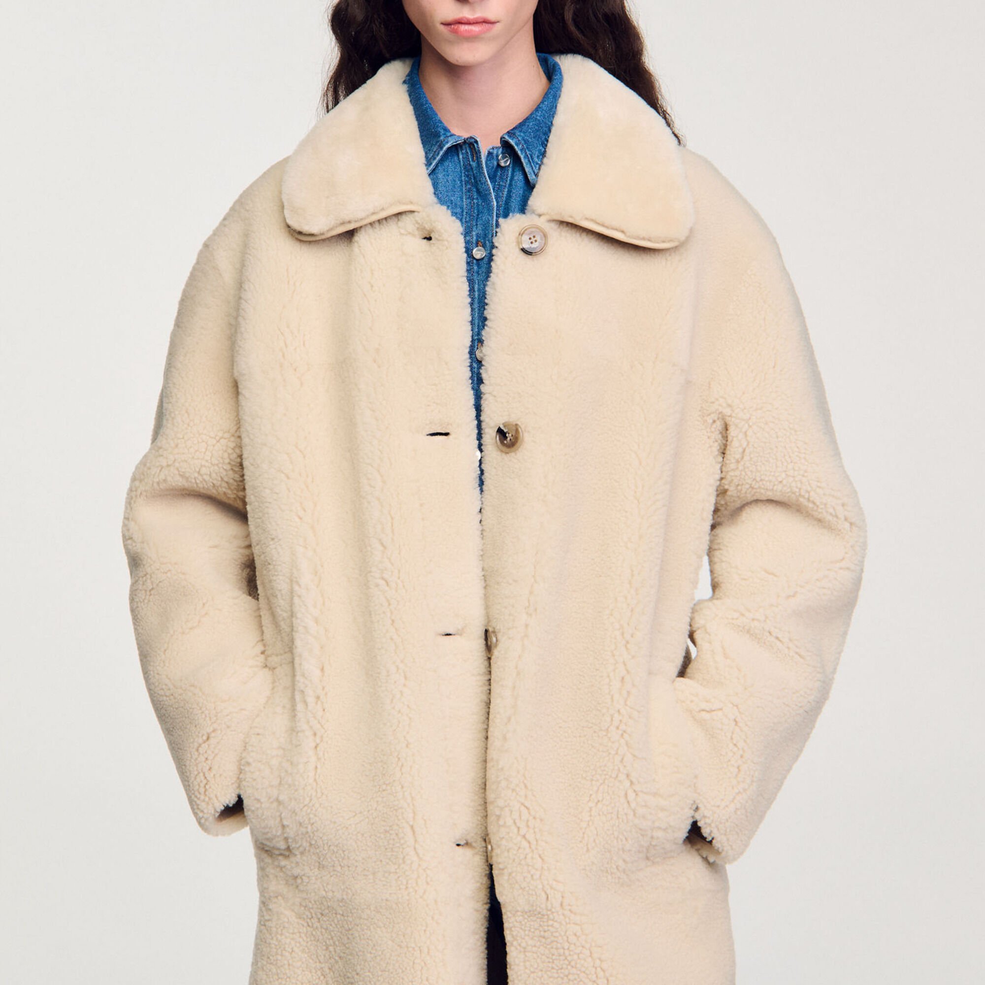 Manteau en peau lainée