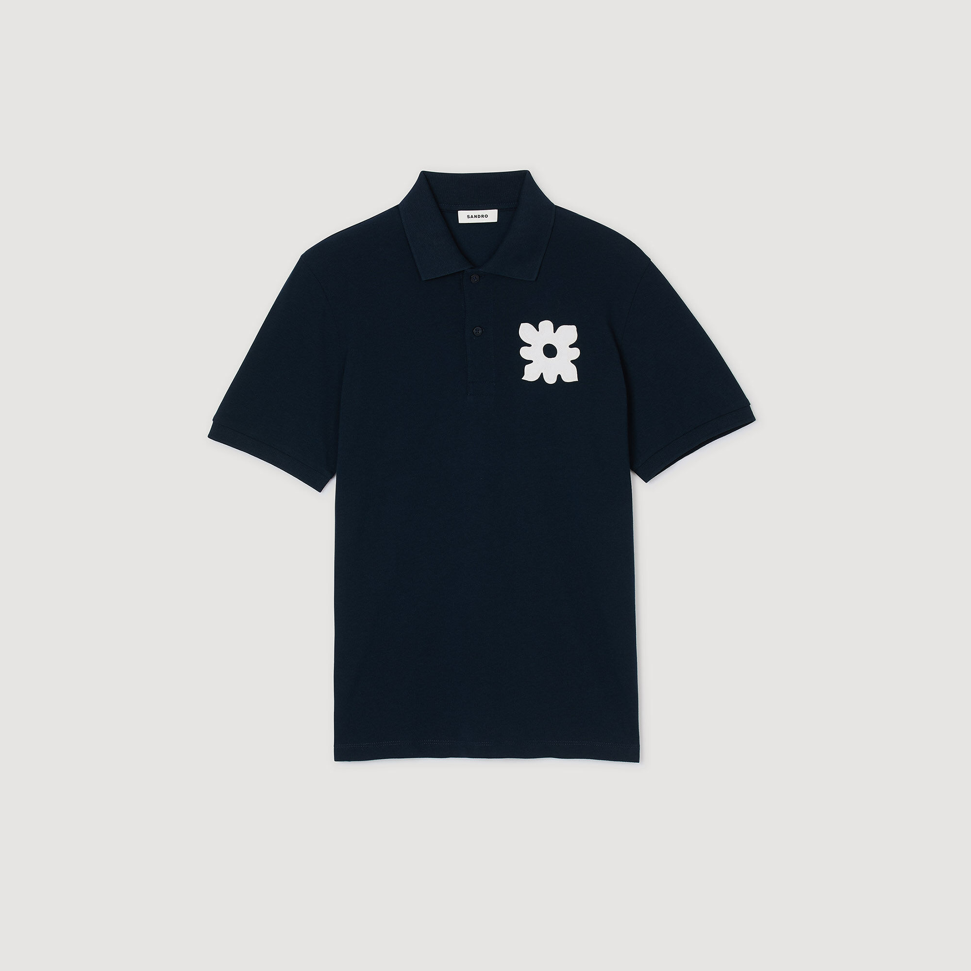 Polo à patch fleur