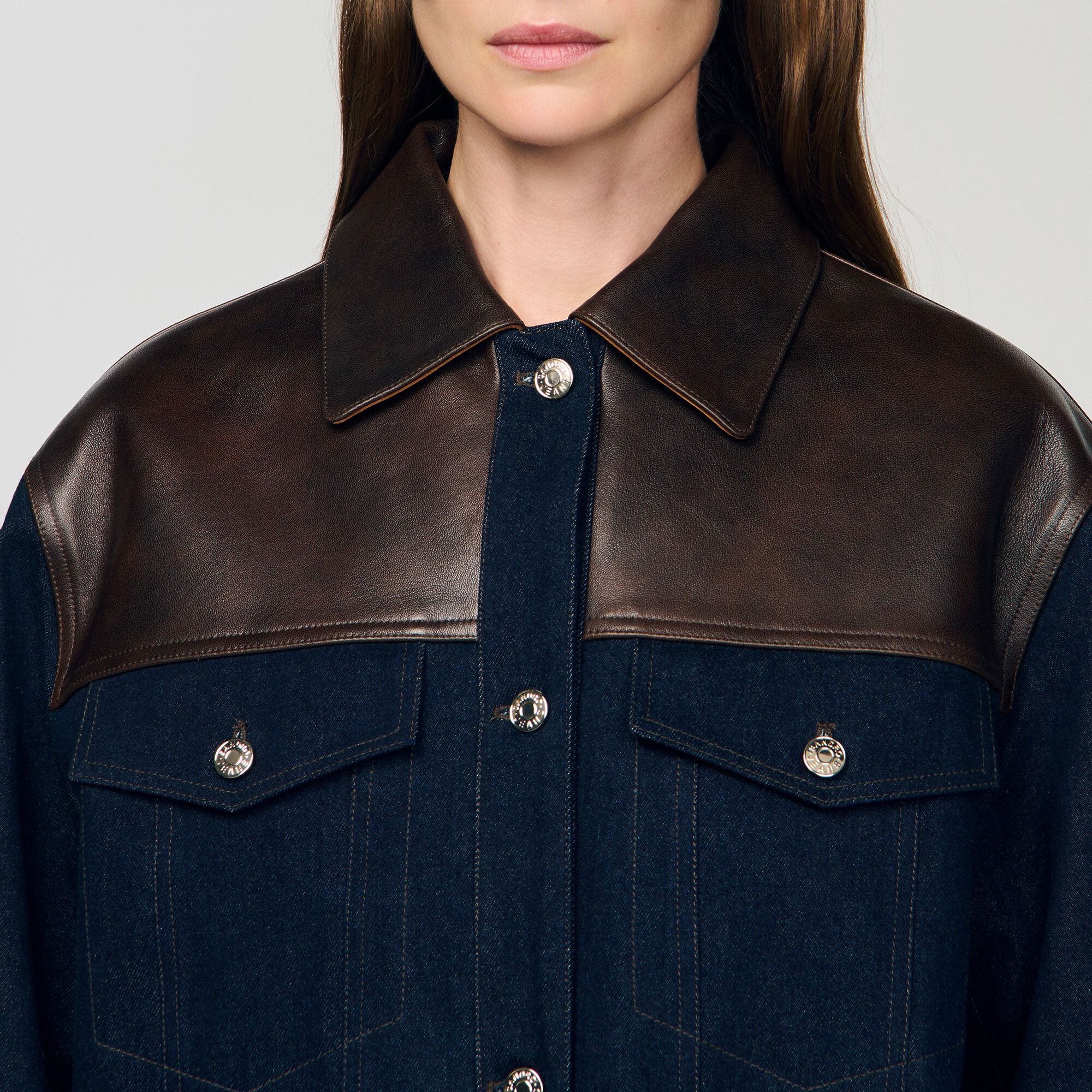 Blouson en denim et en cuir