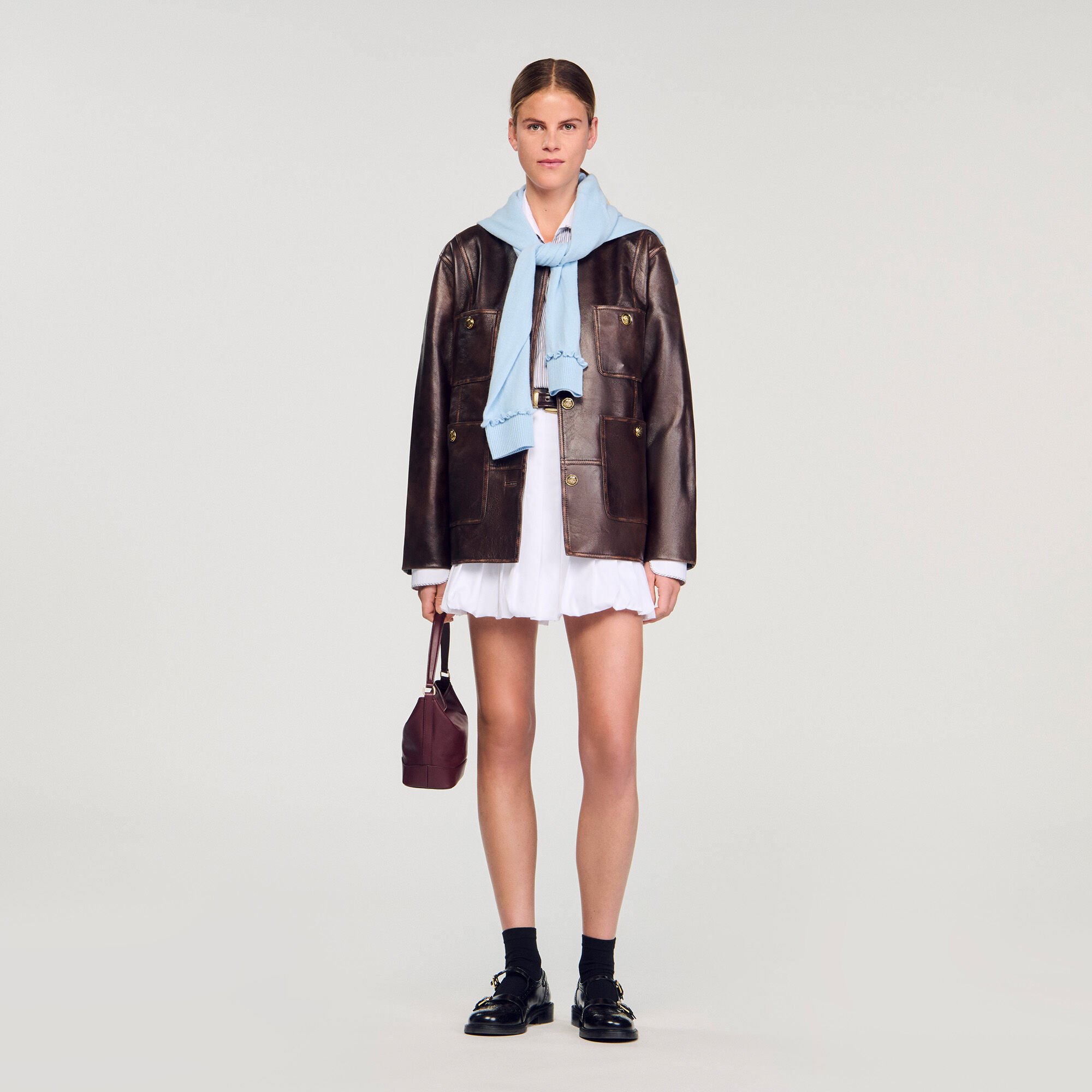 Blouson long en cuir vieilli