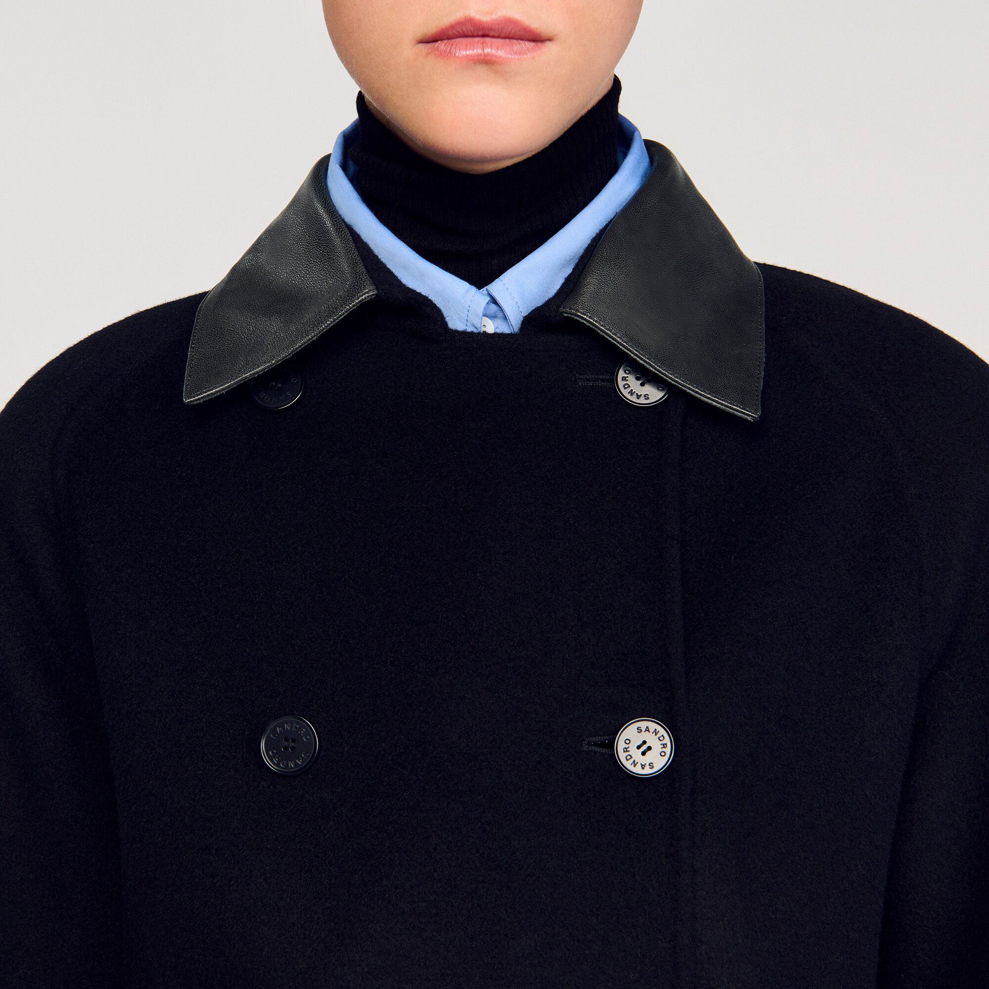 Manteau long en laine et cuir