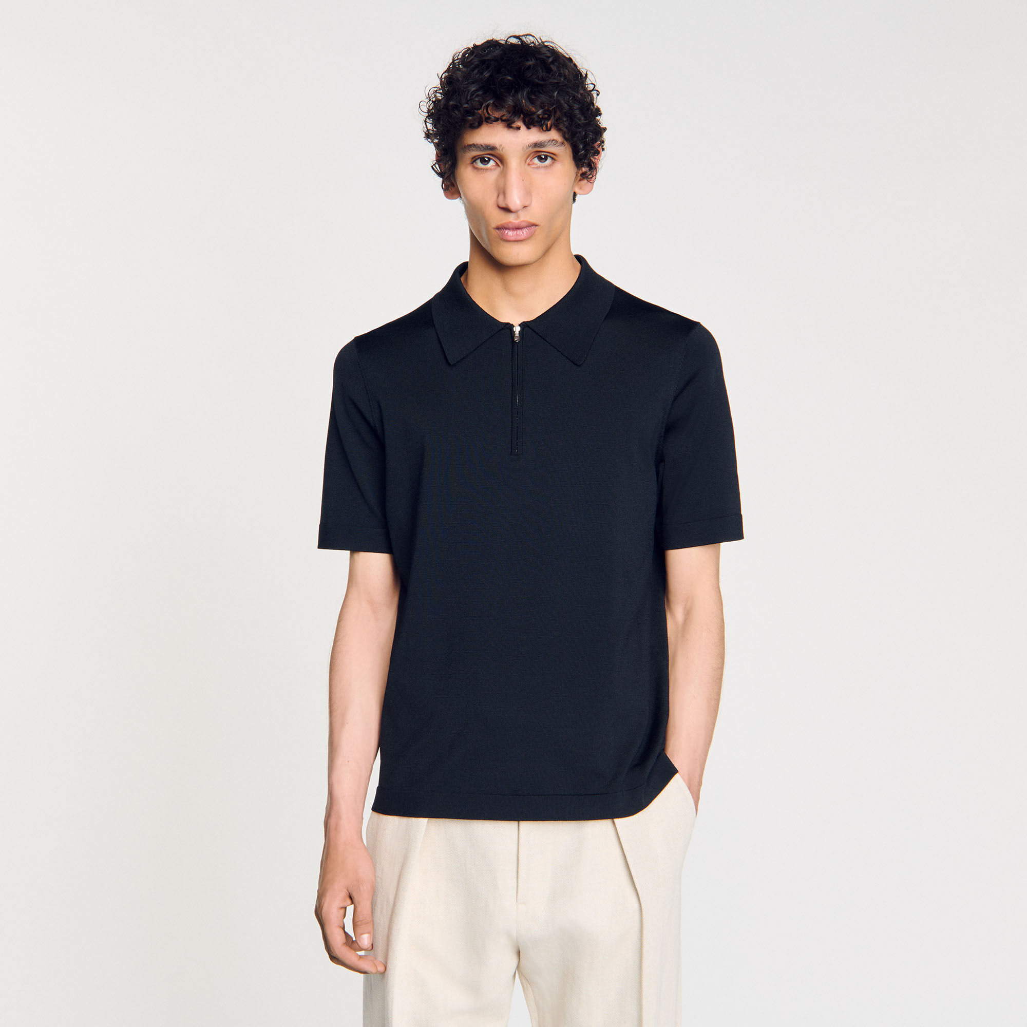 Polo en maille à col zippé