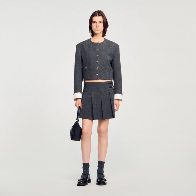 Jupe courte de tailleur strassée