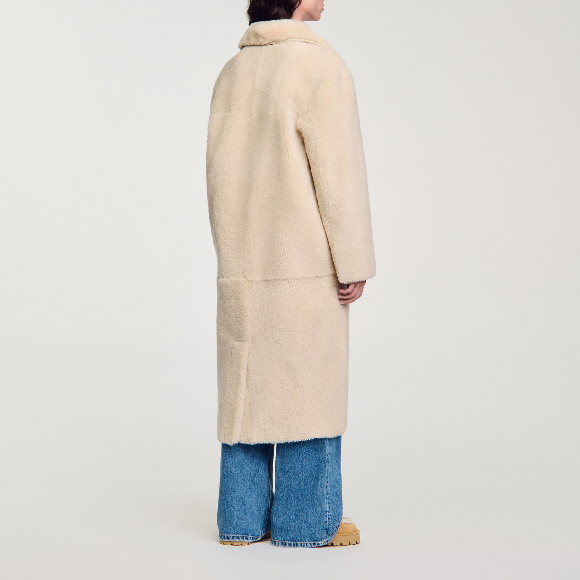 Manteau en peau lainée