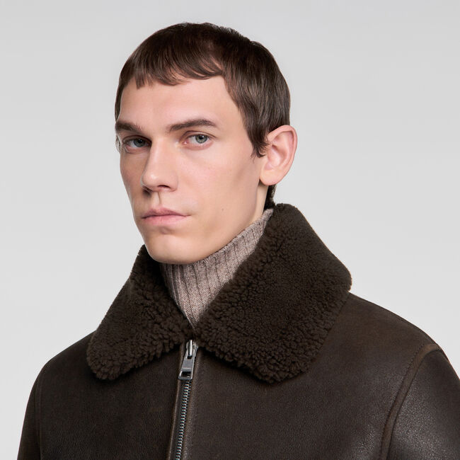 Blouson en peau lain&eacute;e - Homme | Sandro Paris