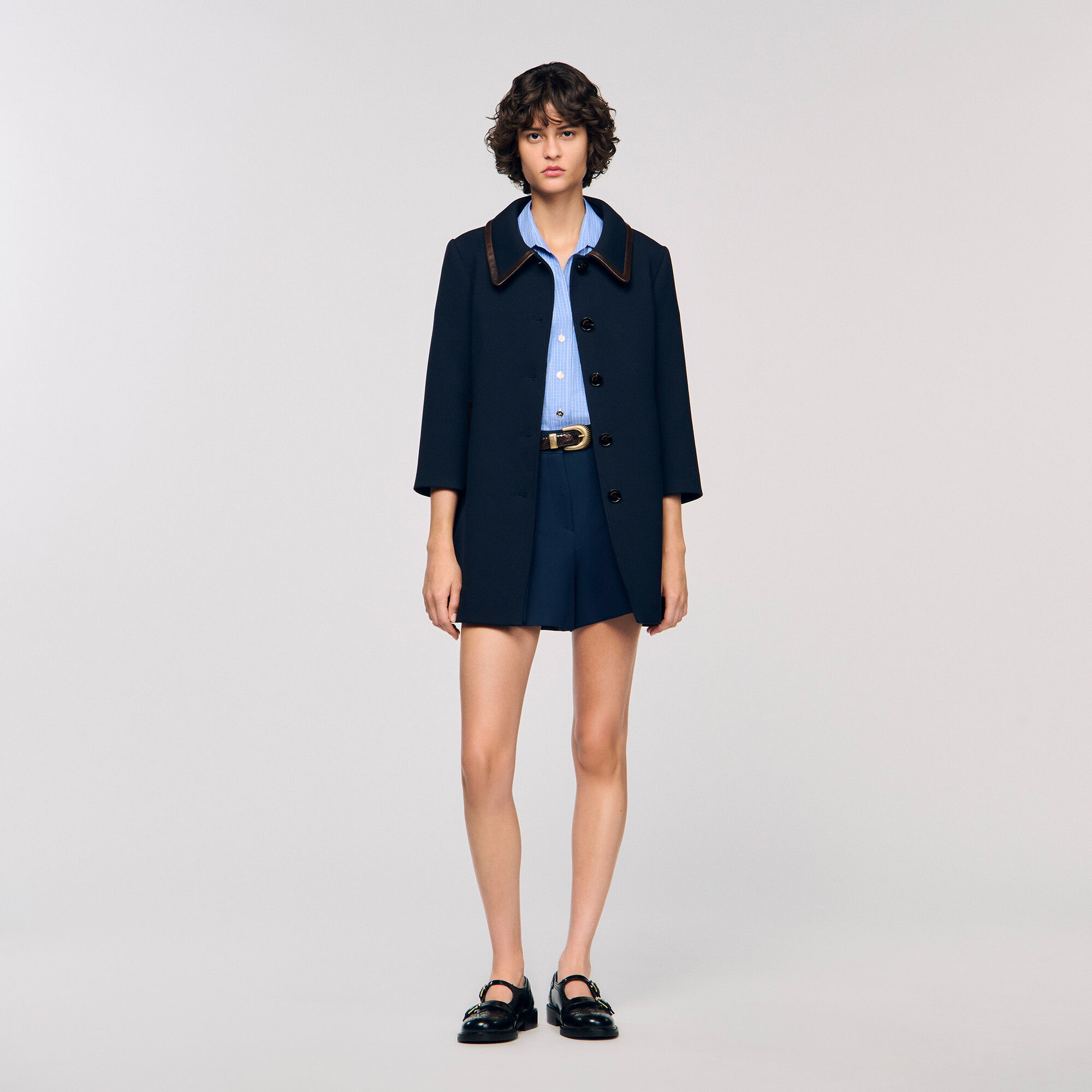 Manteau à bandes en cuir