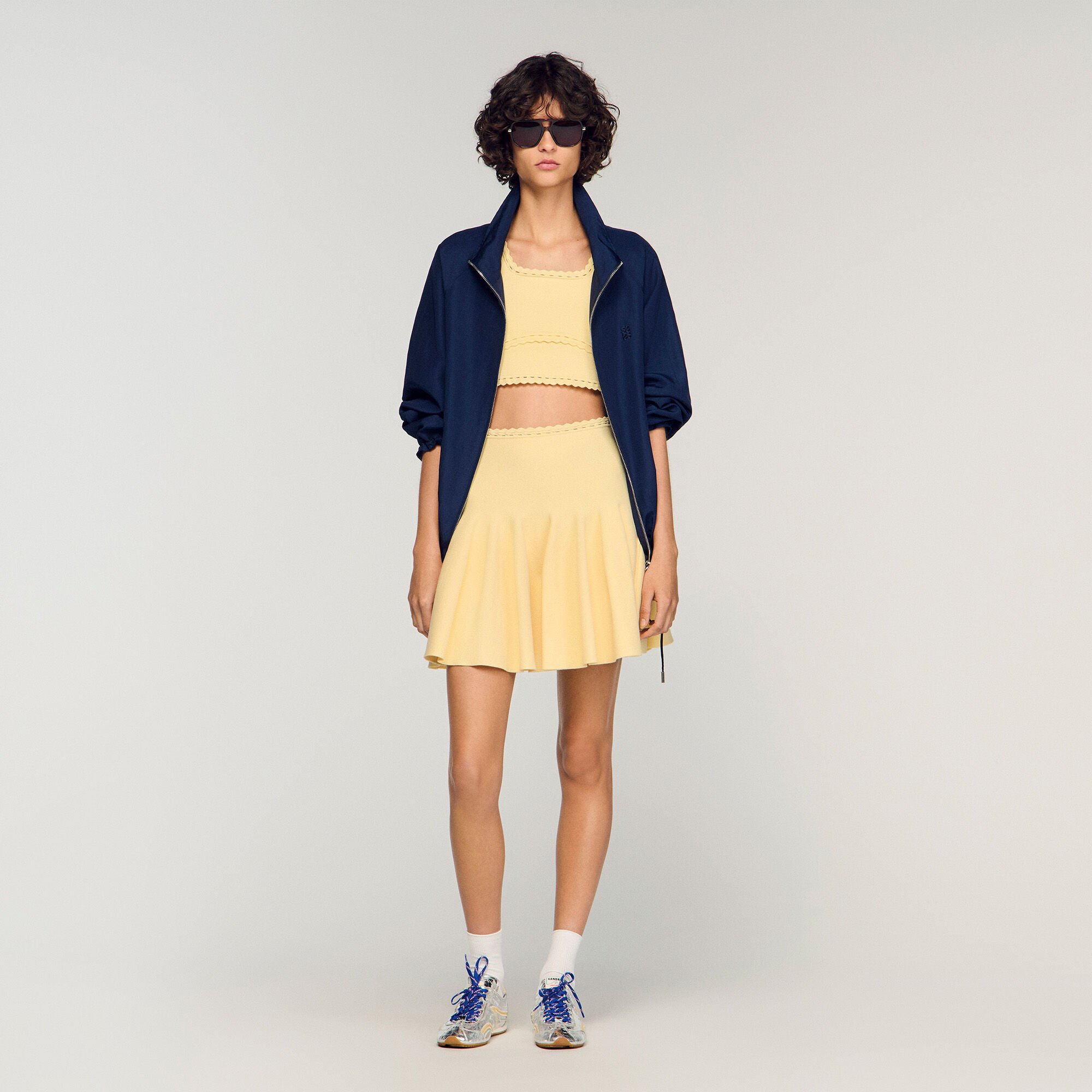 Jupe courte en maille patineuse 