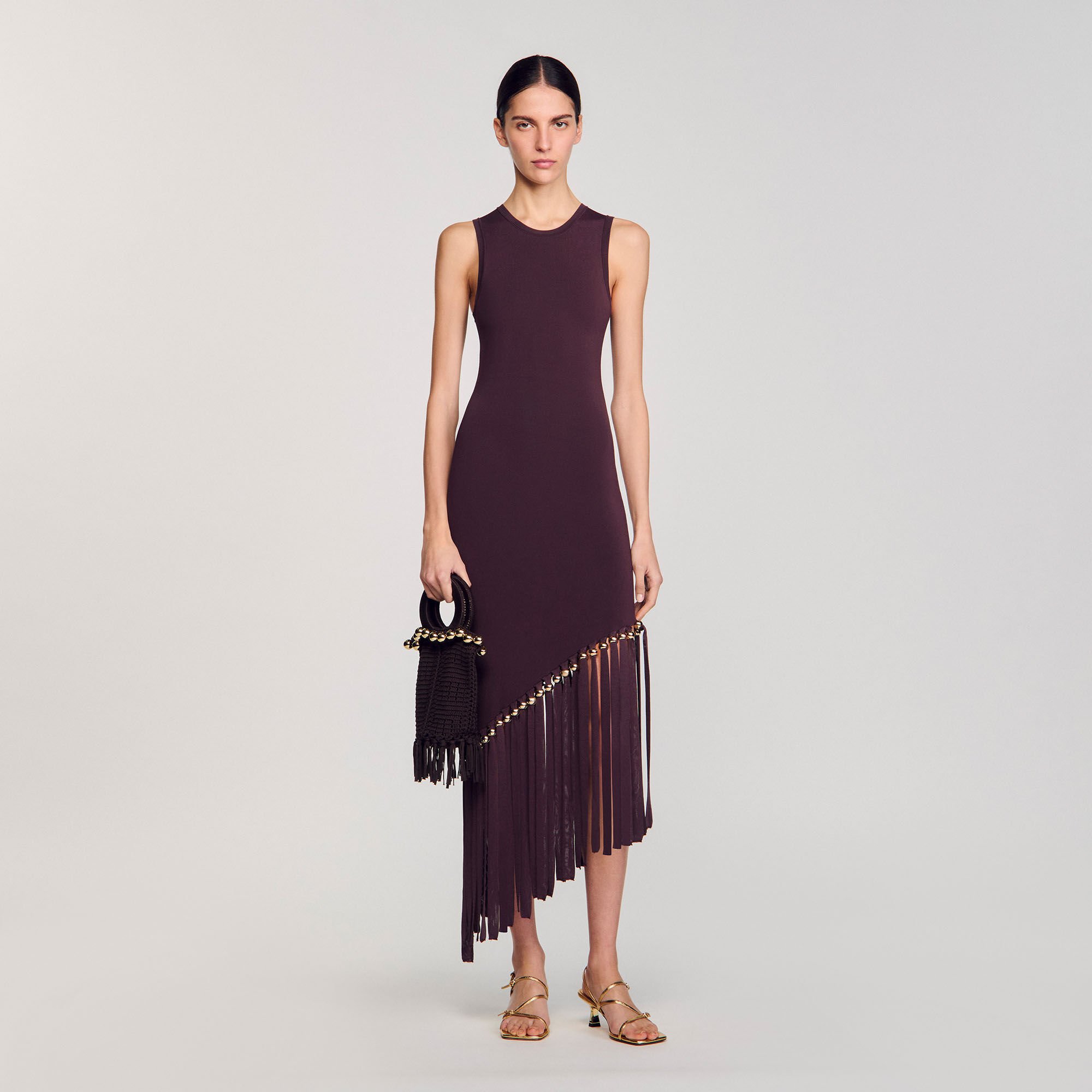 Robe longue frangée et perlée