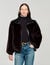 Manteau court en fausse fourrure  Manteau court en fausse fourrure