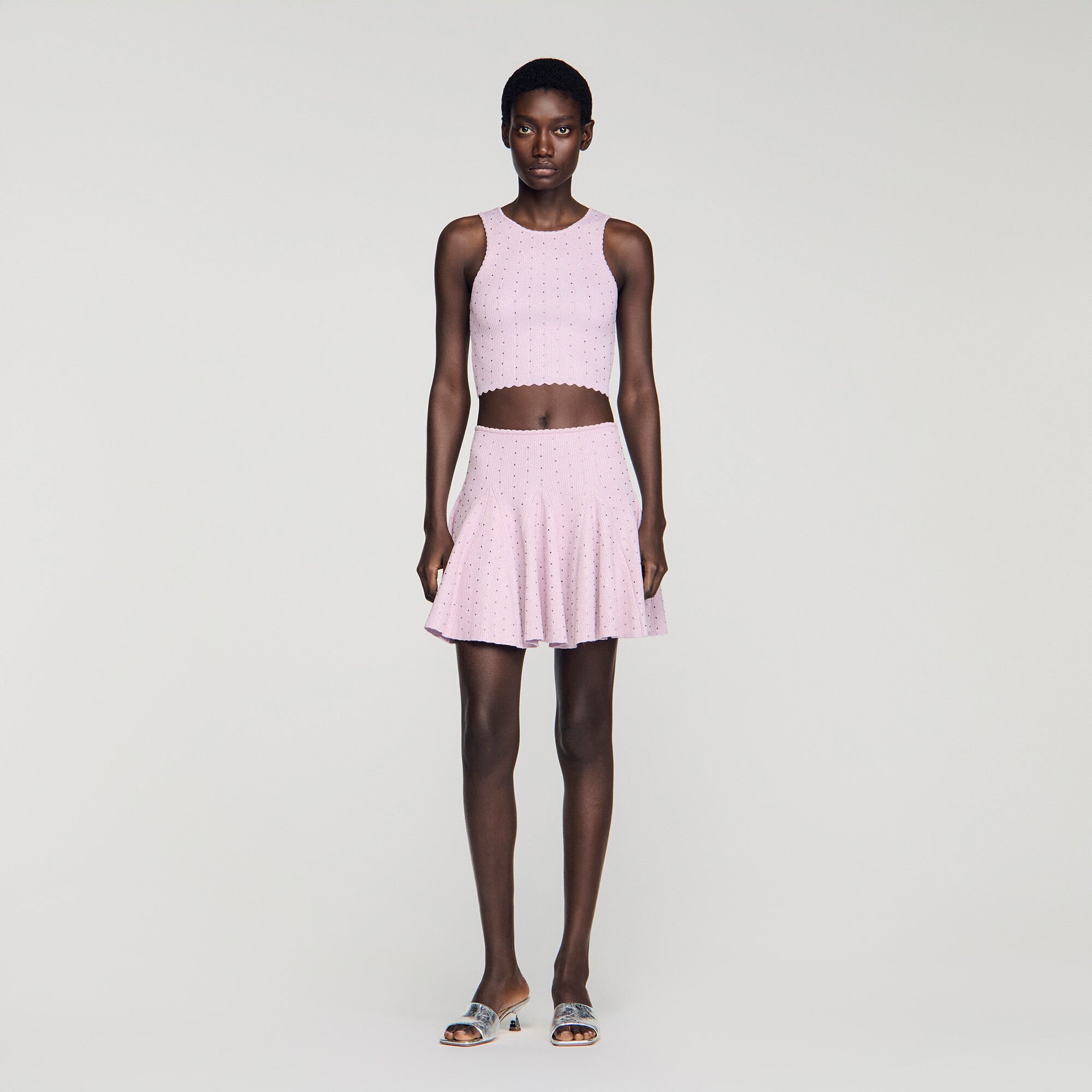 Jupe courte en maille strass&eacute;e