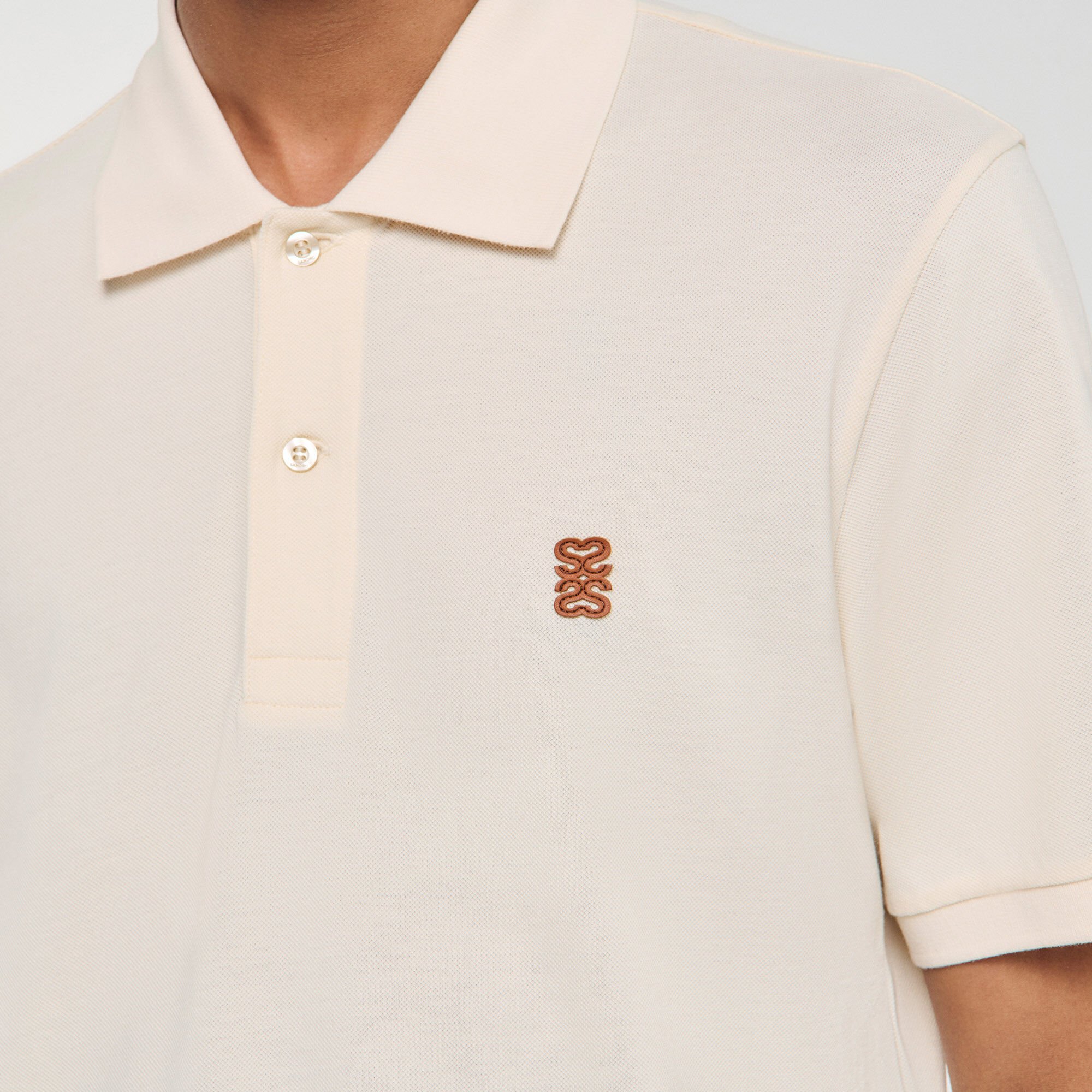 Polo à logo cuir