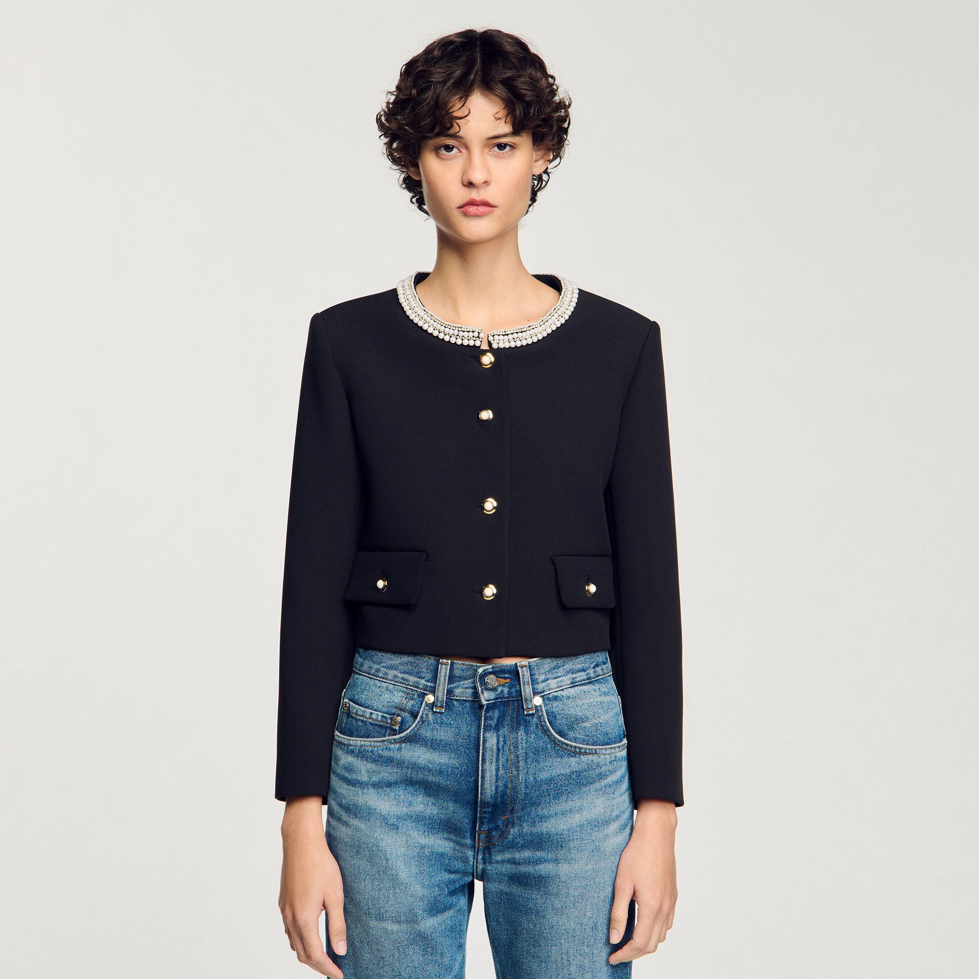 Veste à col perlé
