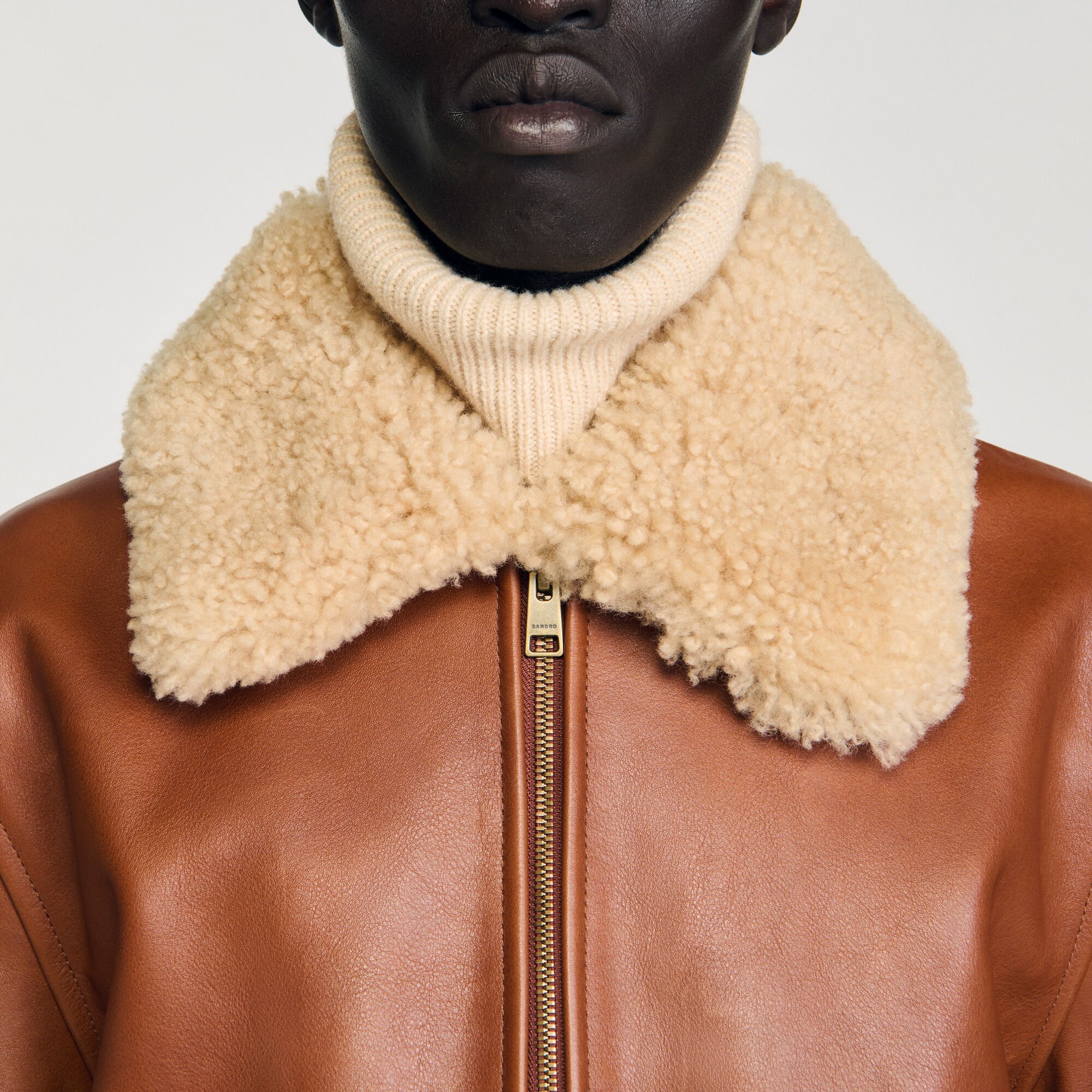 Blouson en cuir à col fourré