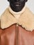 Blouson en cuir à col fourré