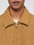 Blouson en raphia tressé
