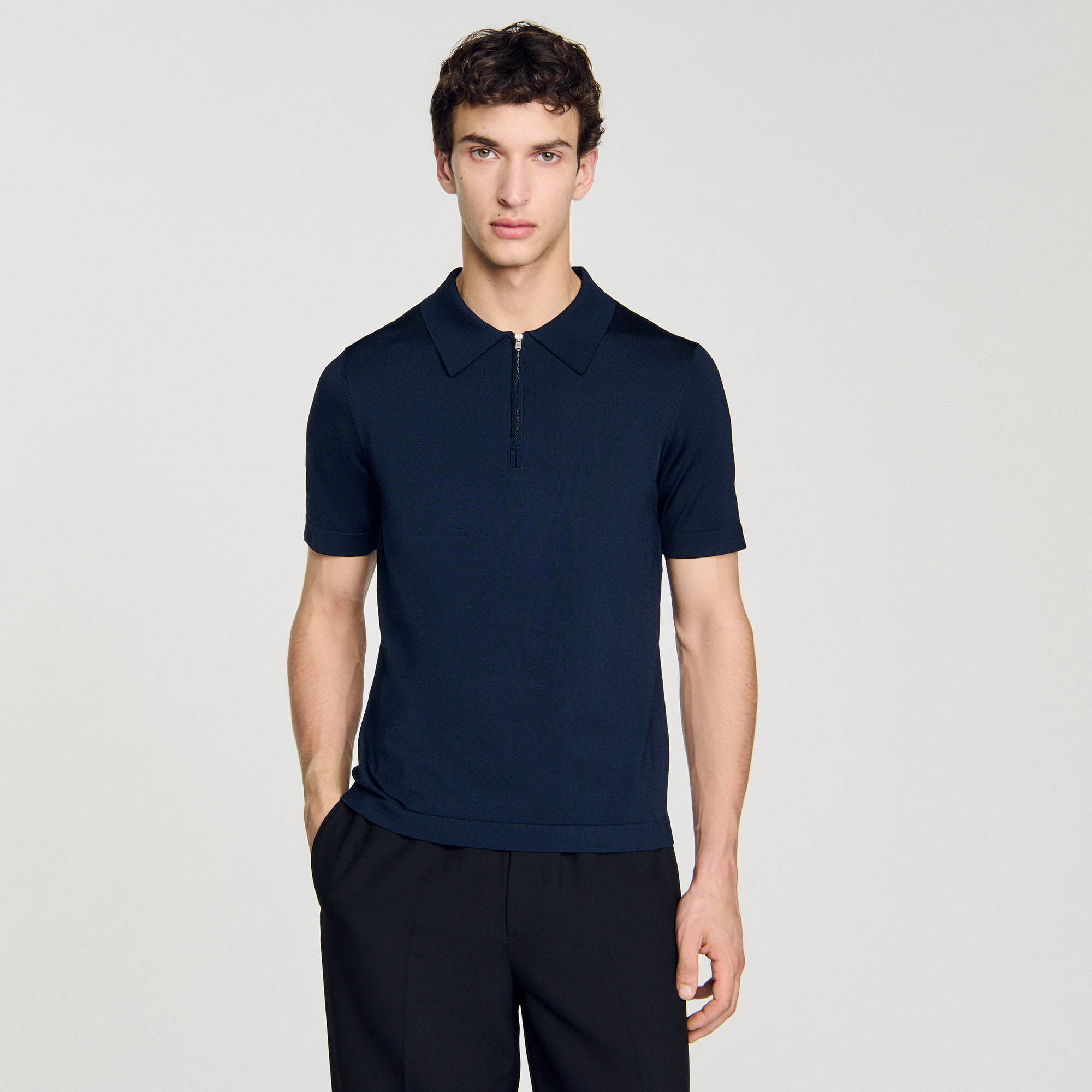 Polo en maille à col zippé