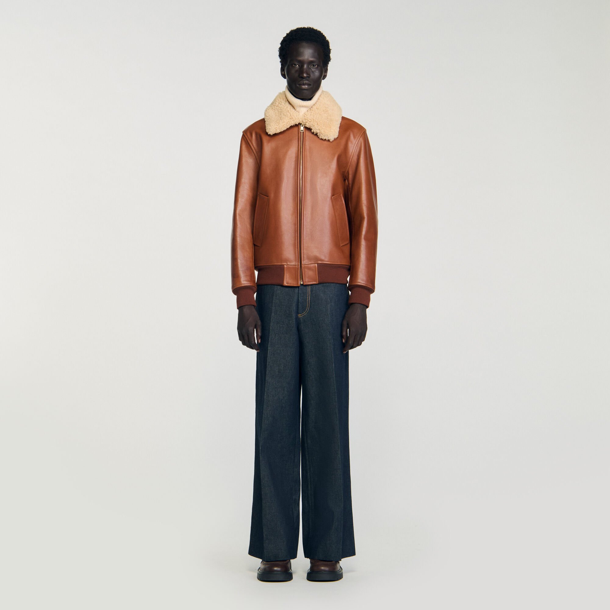 Blouson en cuir à col fourré