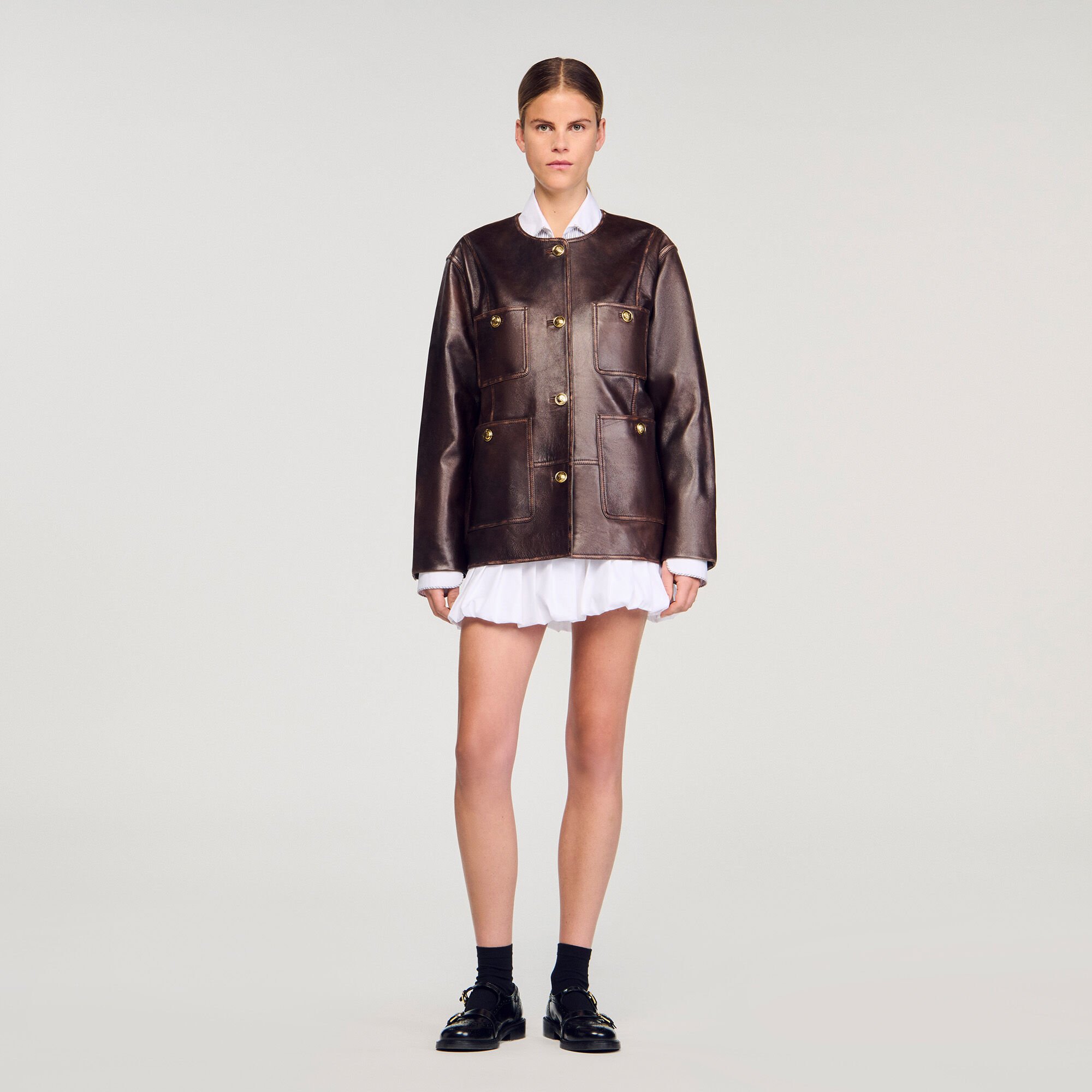 Blouson long en cuir vieilli