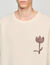 Pull en laine à détail fleur