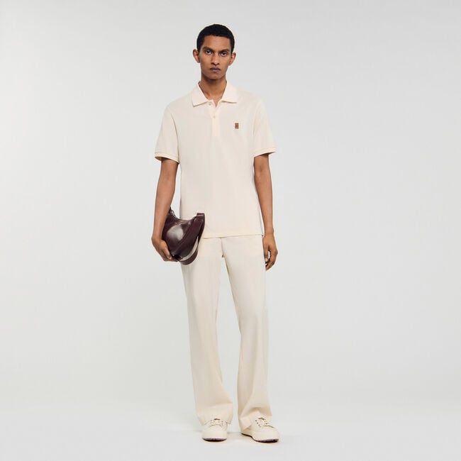 Polo à logo cuir