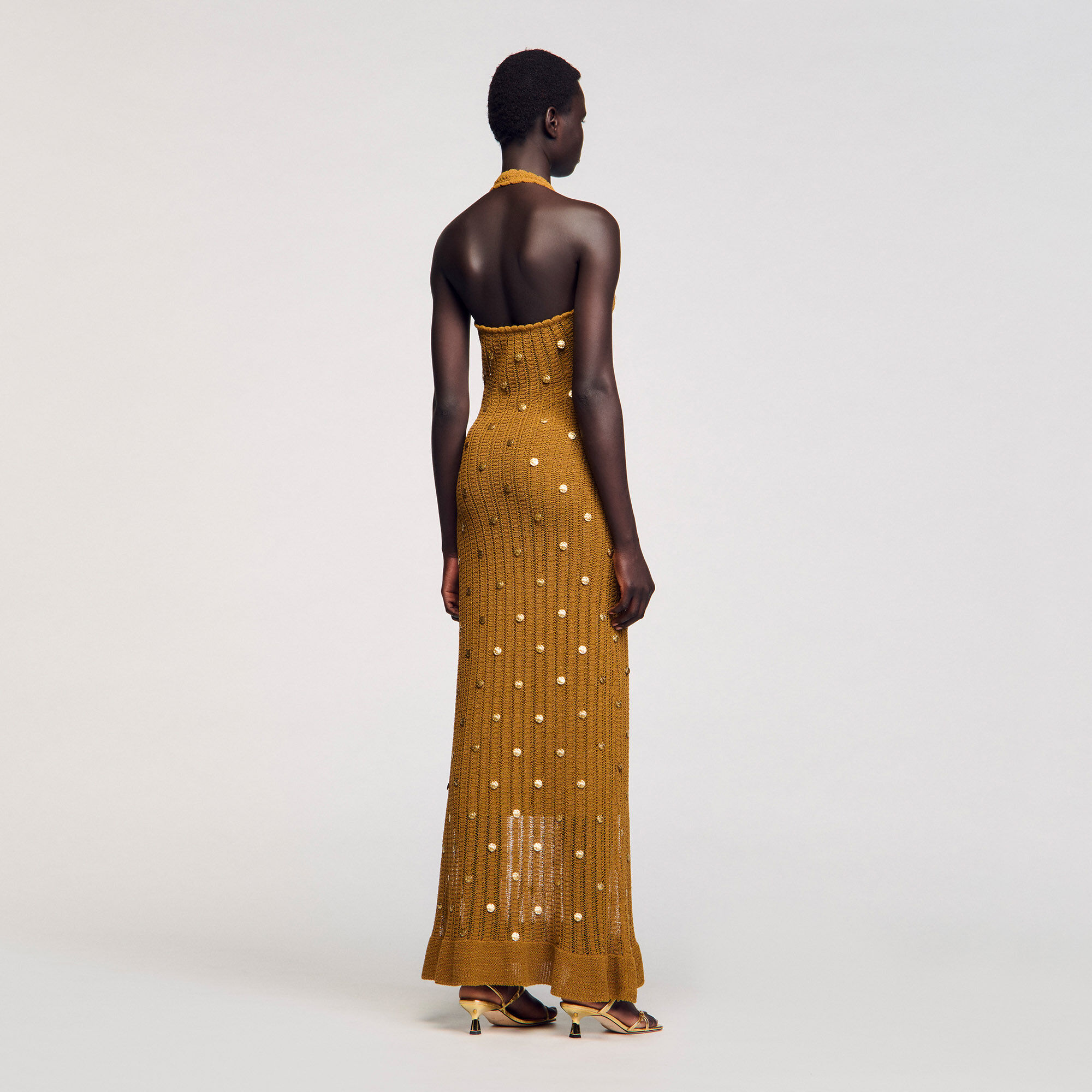 Robe longue en maille à pampilles