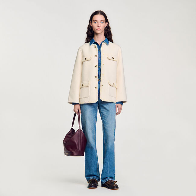 Manteau à finitions tressées