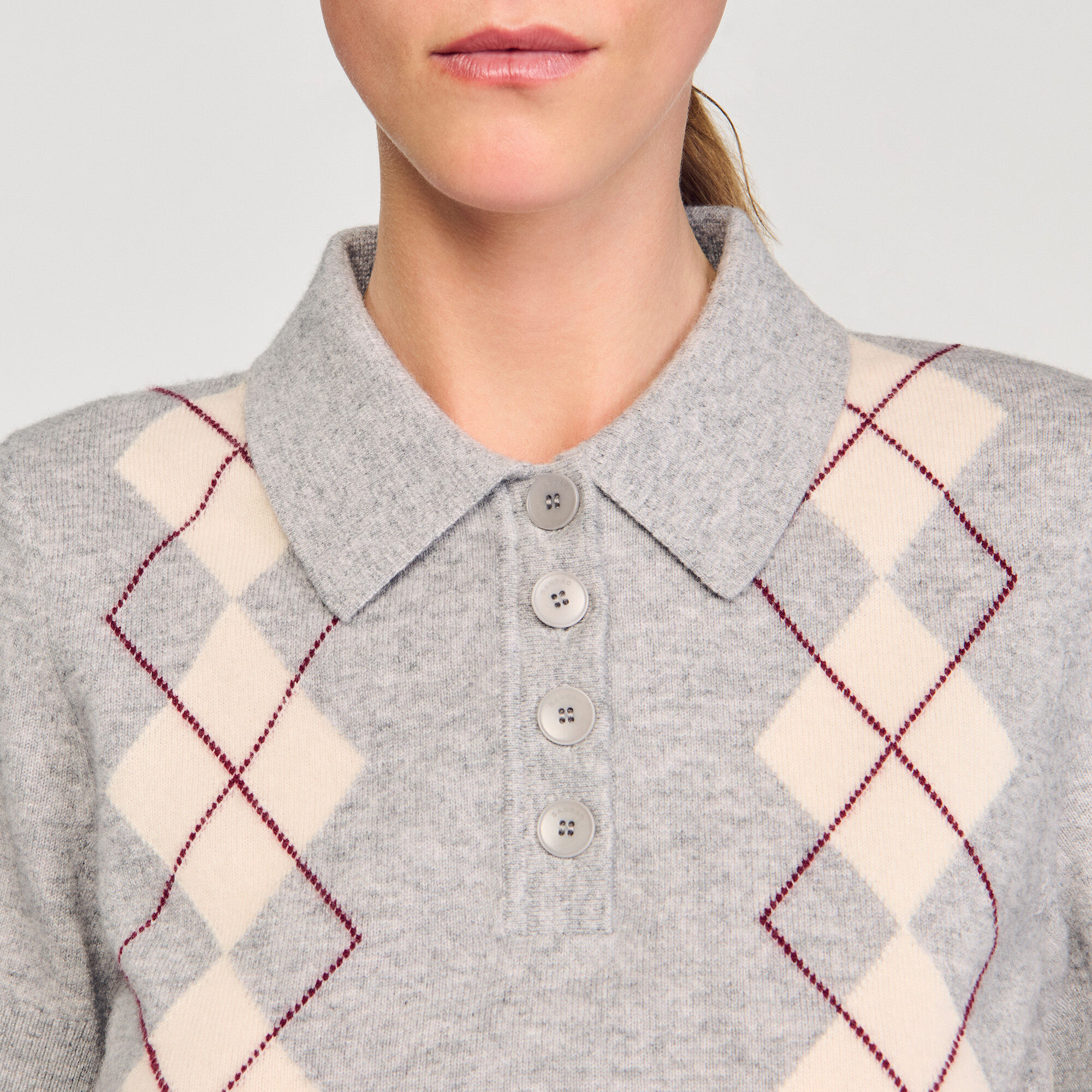 Pull à losanges et col polo