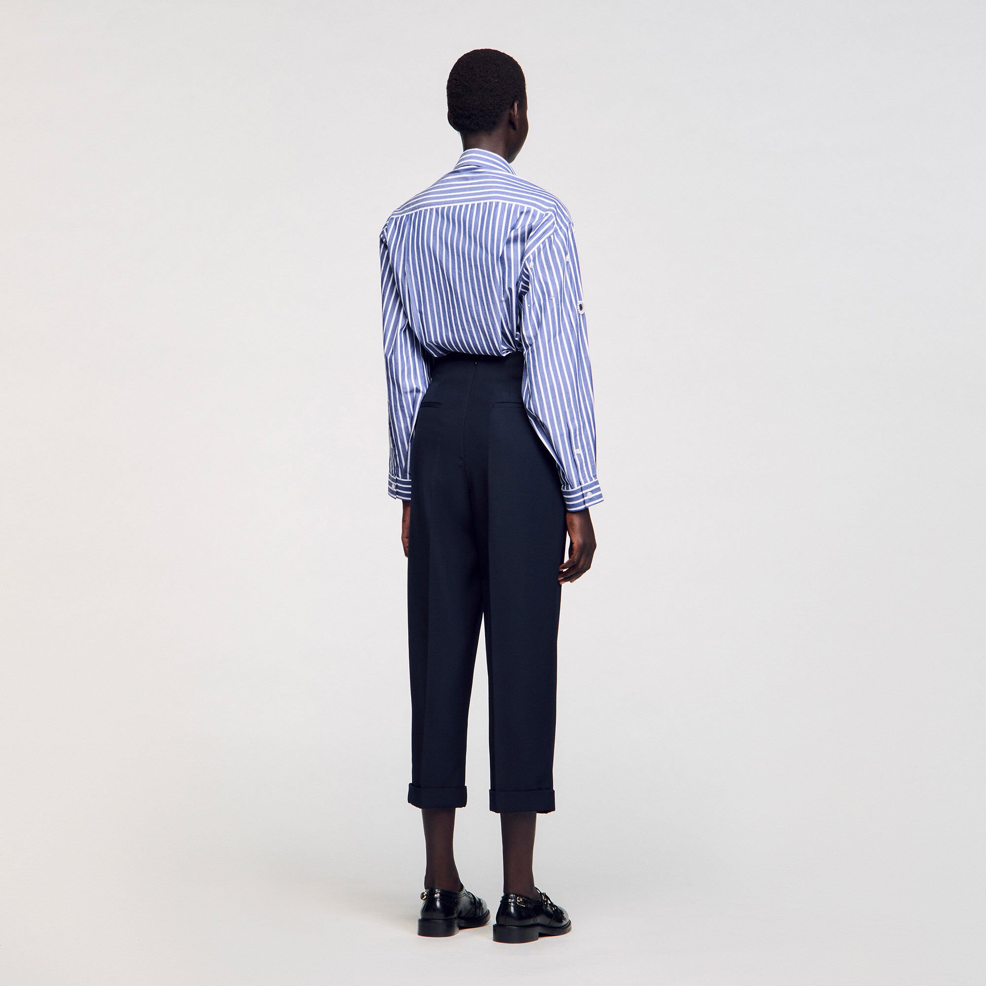 Pantalon de costume à plis