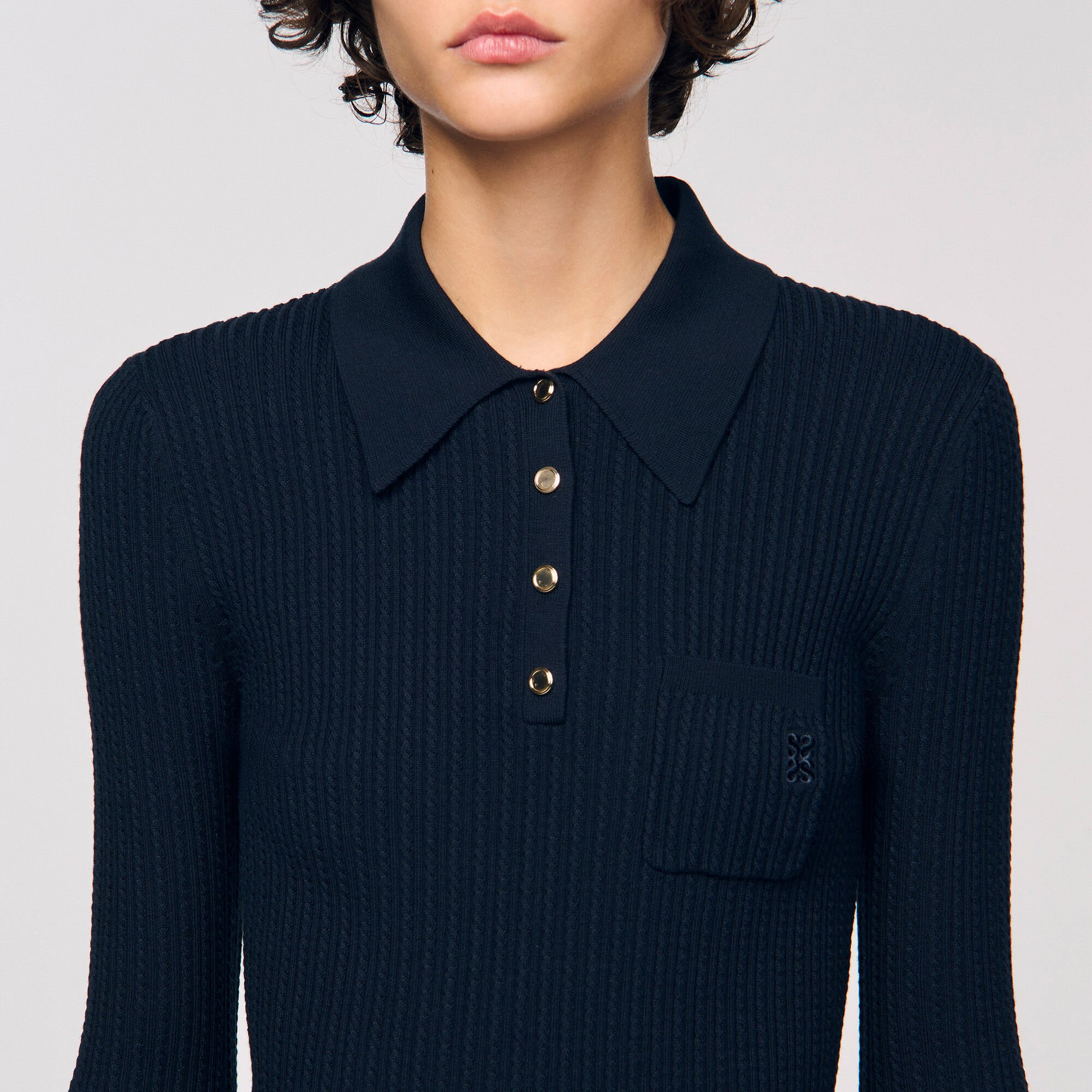 Pull polo en maille torsadée